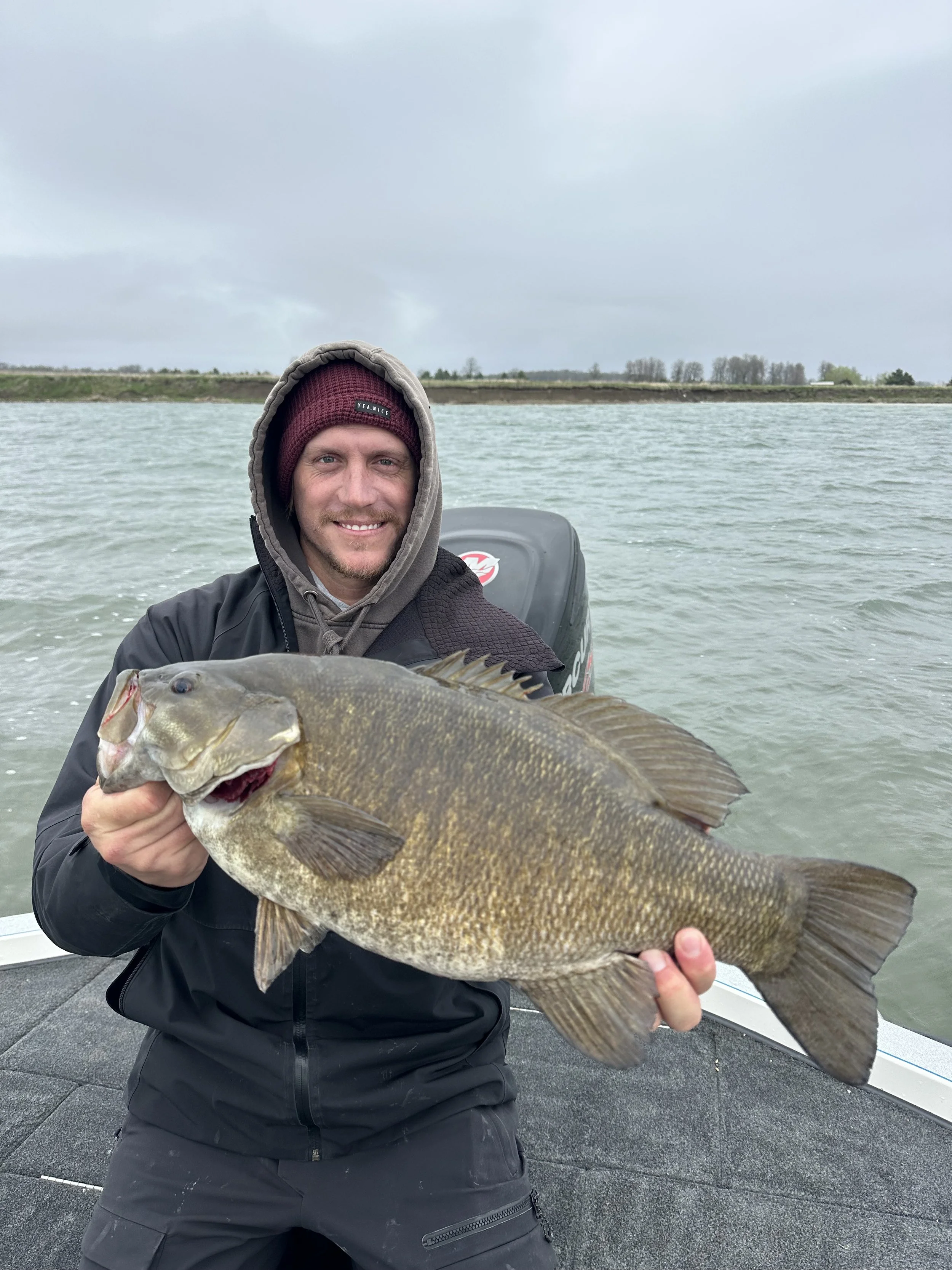 Client catches 7lb smallmouth bass on guide trip in Cape Vincent