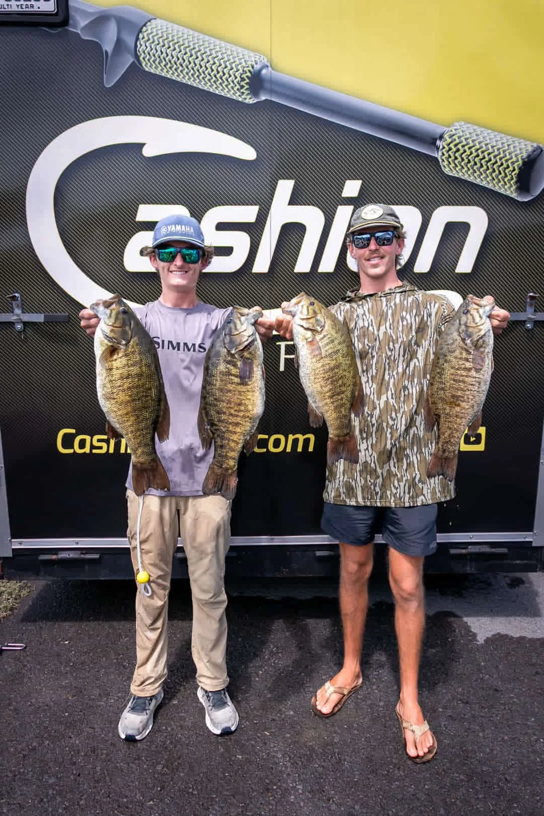 Zack Eggleston holding 4 big smallmouth bass at tournament in Clayton New York