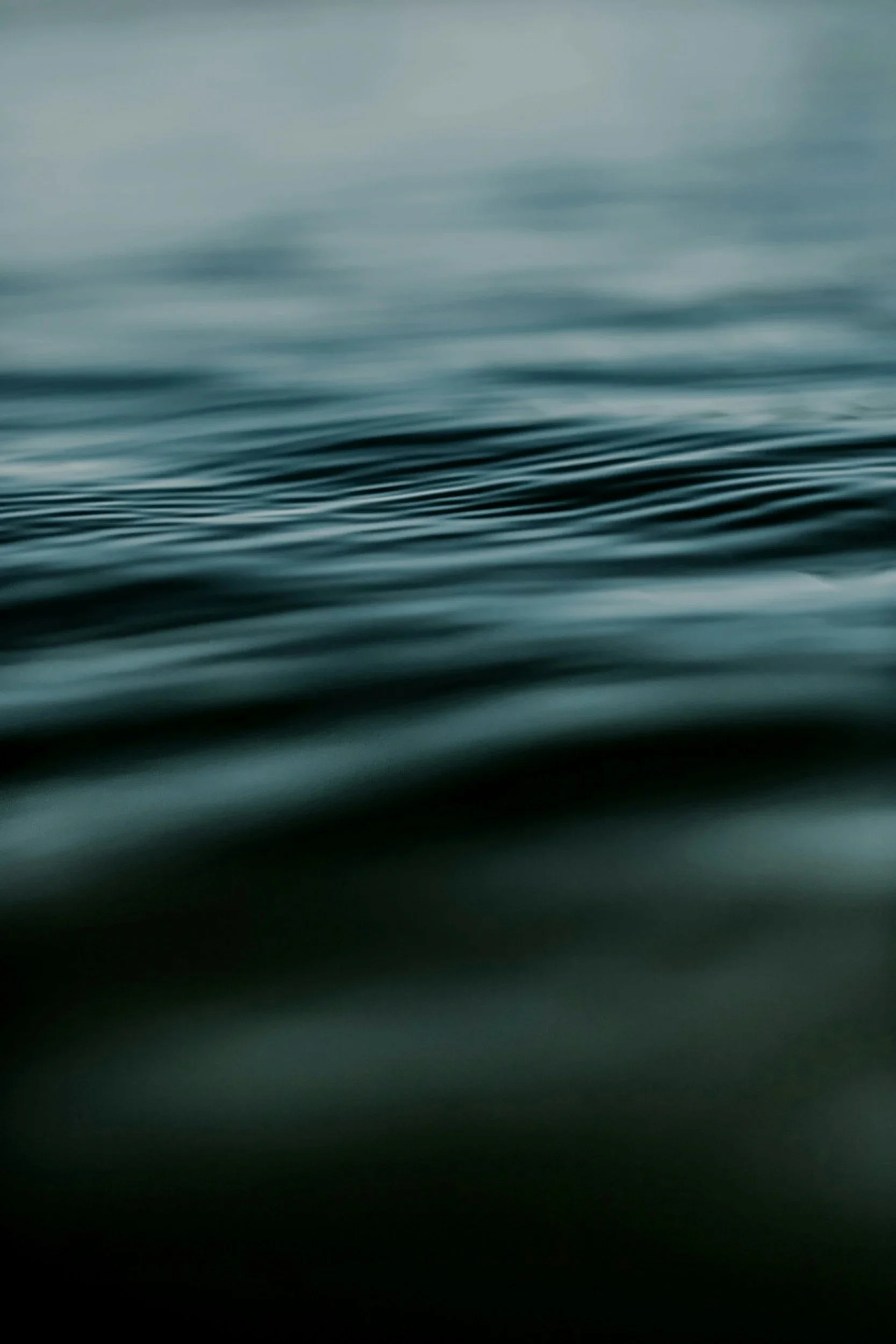 Close-up of calm, rippling dark water