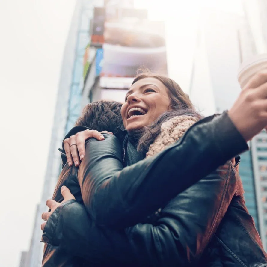 Two women hugging in NYC