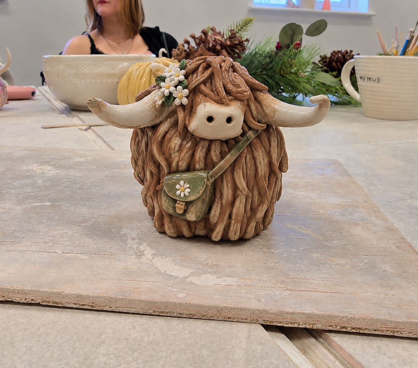 Hand-Painted Highland Cow with Satchel.png