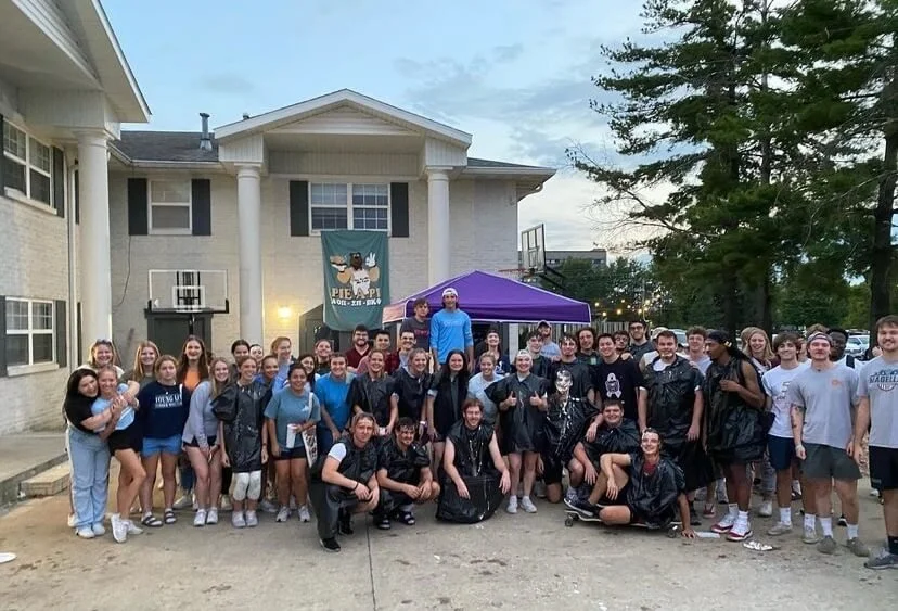 Alpha Rho Group Photo at the House 2.jpeg