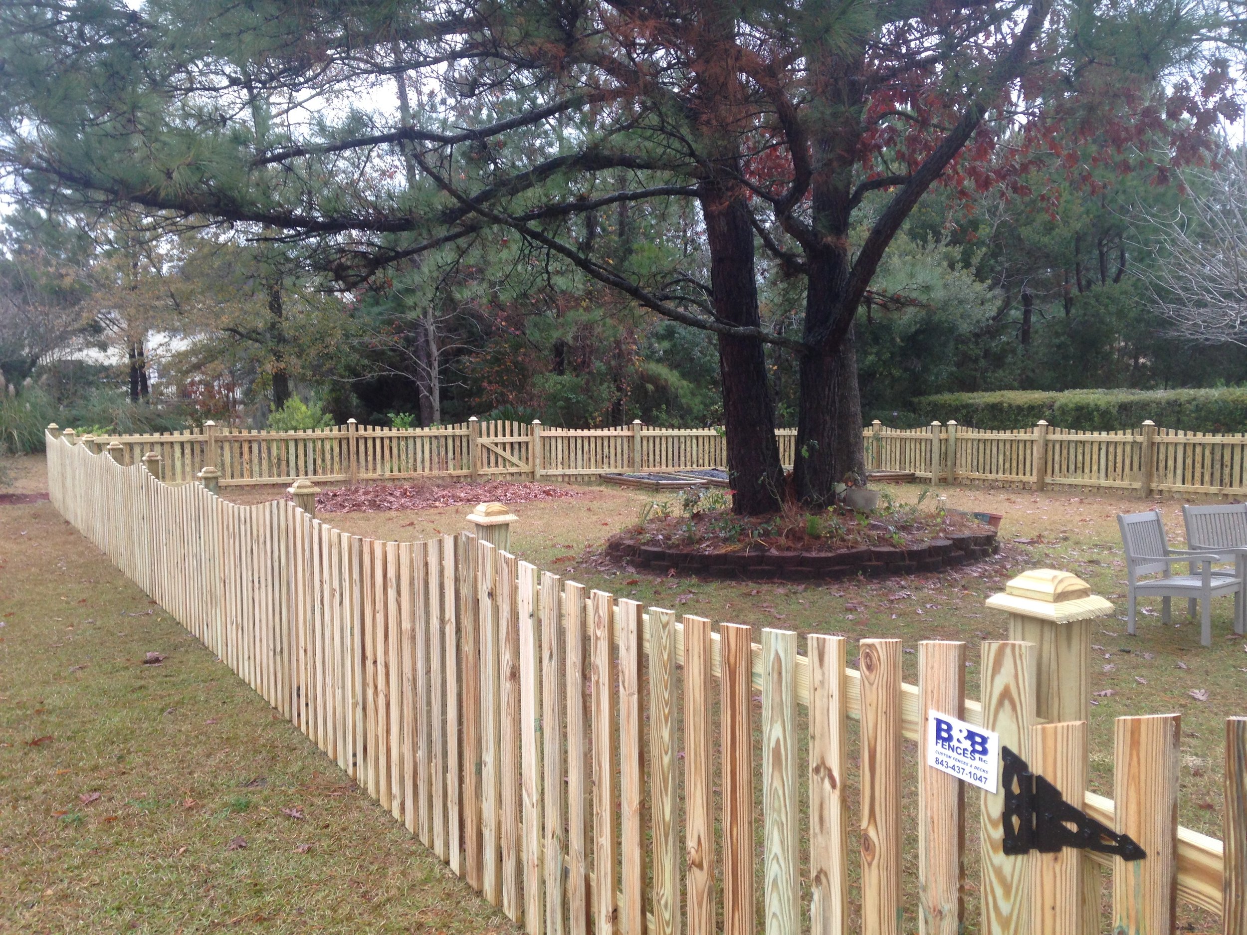 Treated Yellow Pine 4' Down-Scalloped Fence