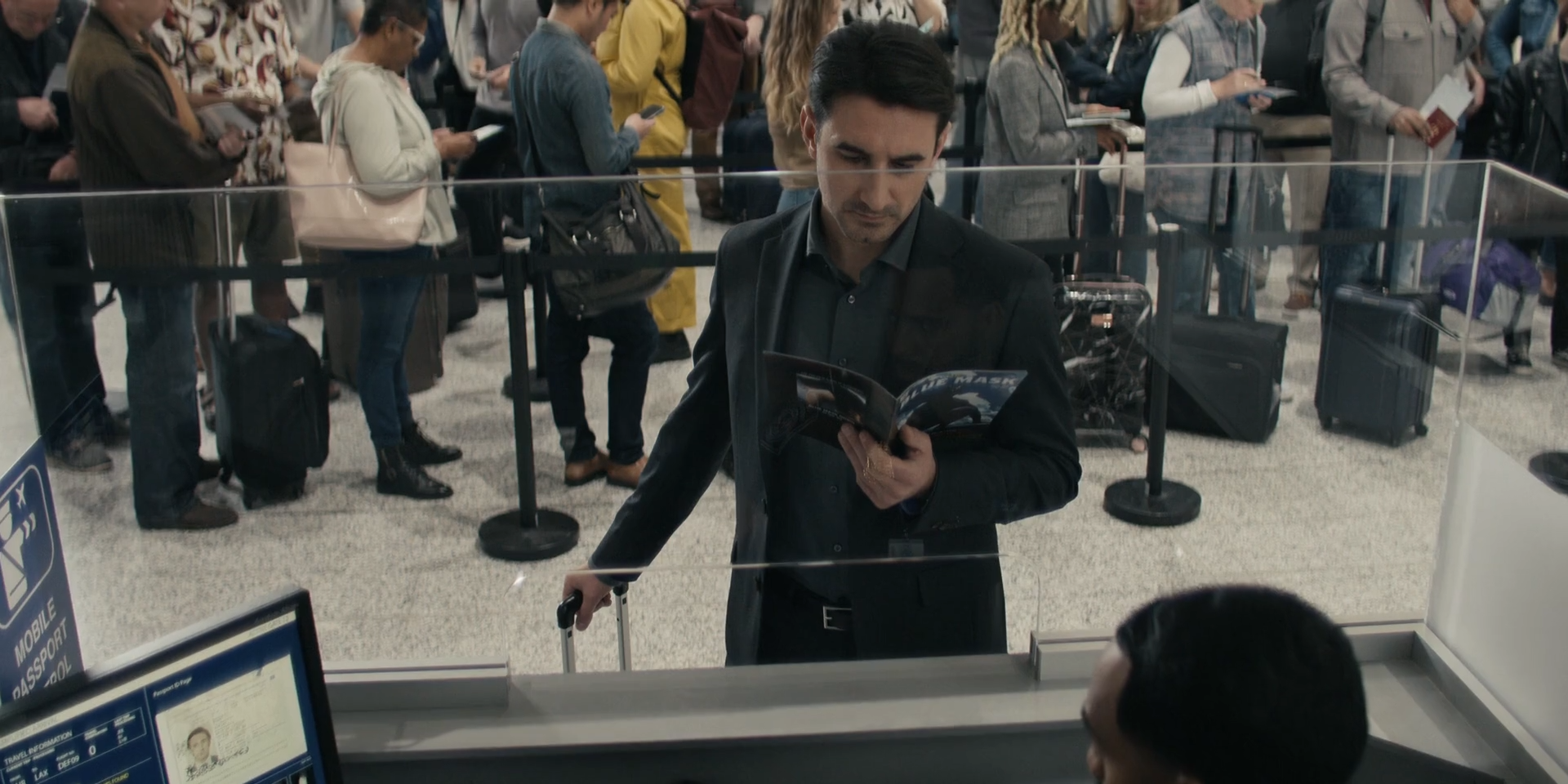 Reacher S2E1 Playback 13 - Airport Monitor (0-34-35-01).png