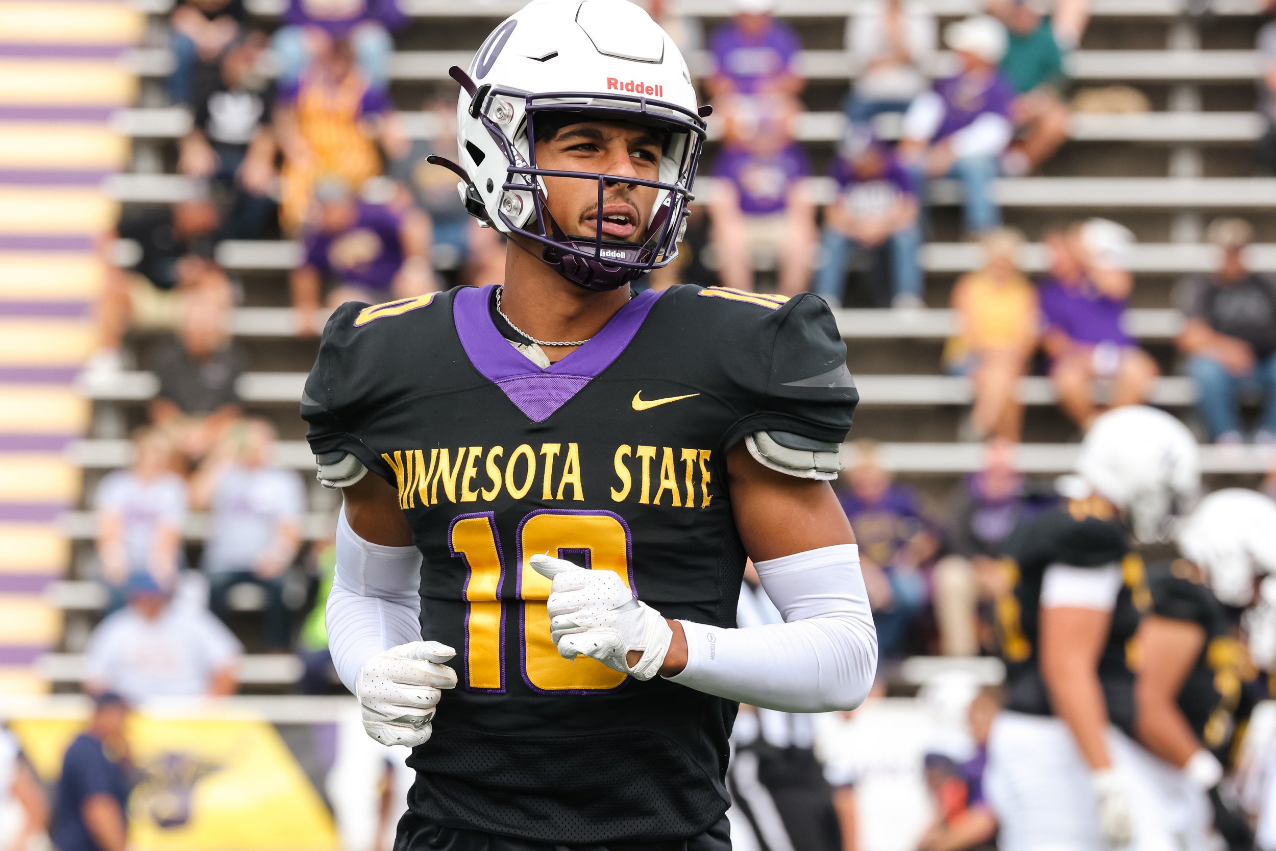 Close-up of wide receiver in a stadium.jpg