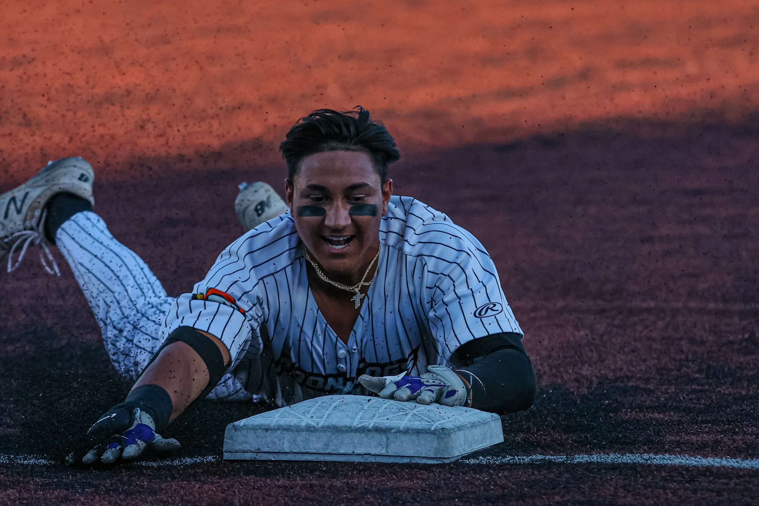Baseball Player Sliding to base.jpg