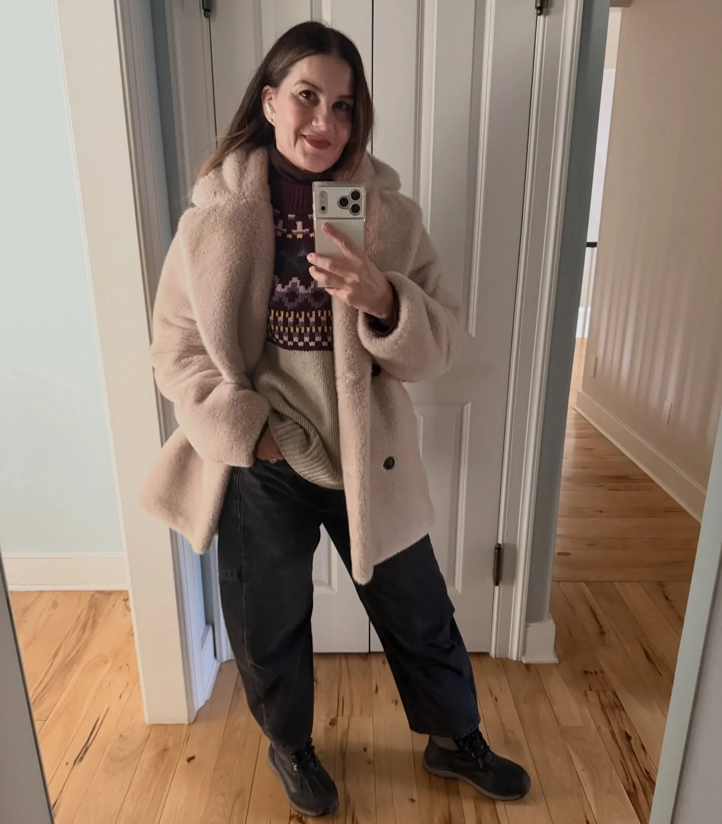 A furry coat will keep you super warm on those cold, blustery days.