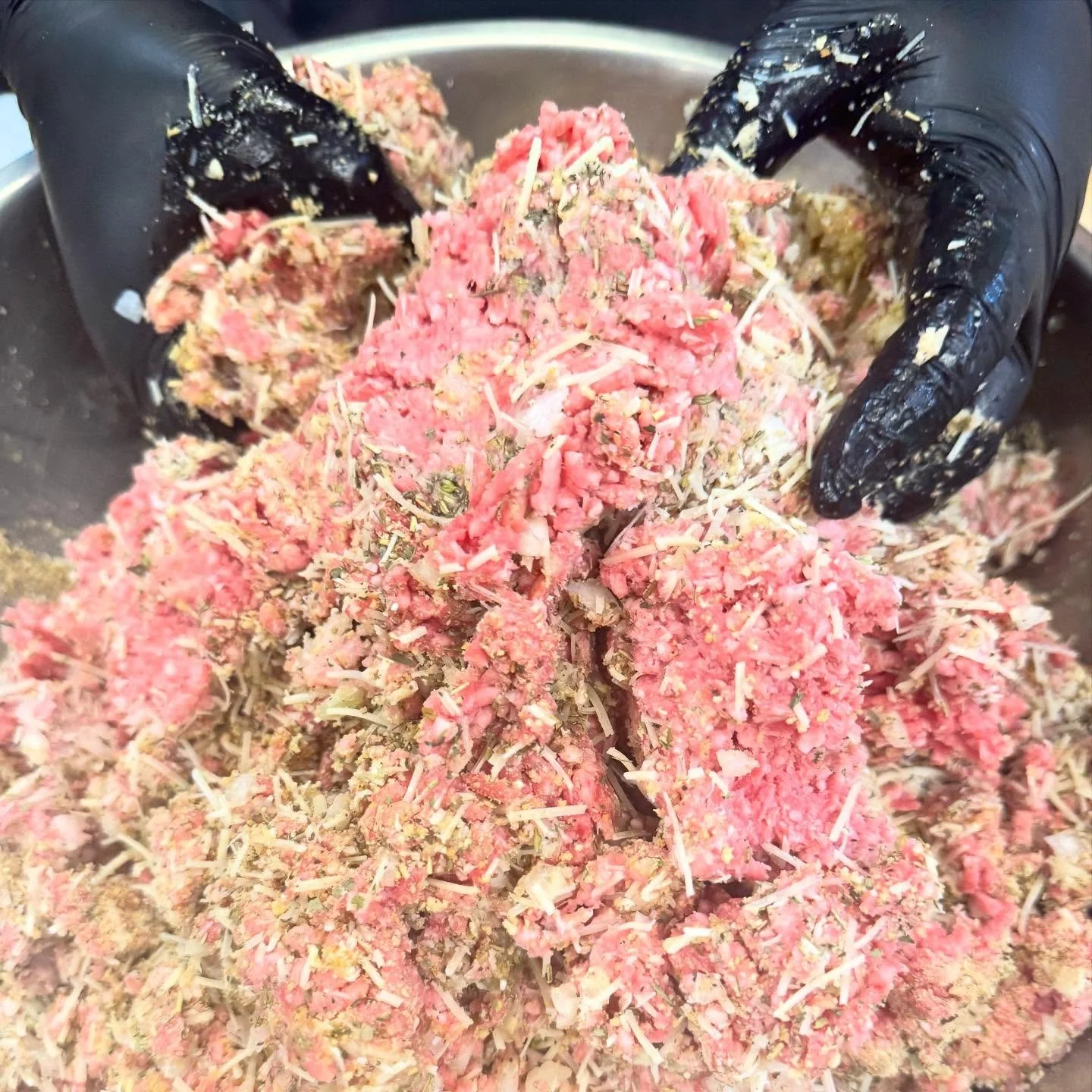 Meatballs in the making! Every batch of our fresh meatballs is hand-seasoned, mixed, and packed right here in-house. No shortcuts, just real ingredients and a whole lot of flavor. Swipe for the finished product. 
Swing by and grab a pack for an easy