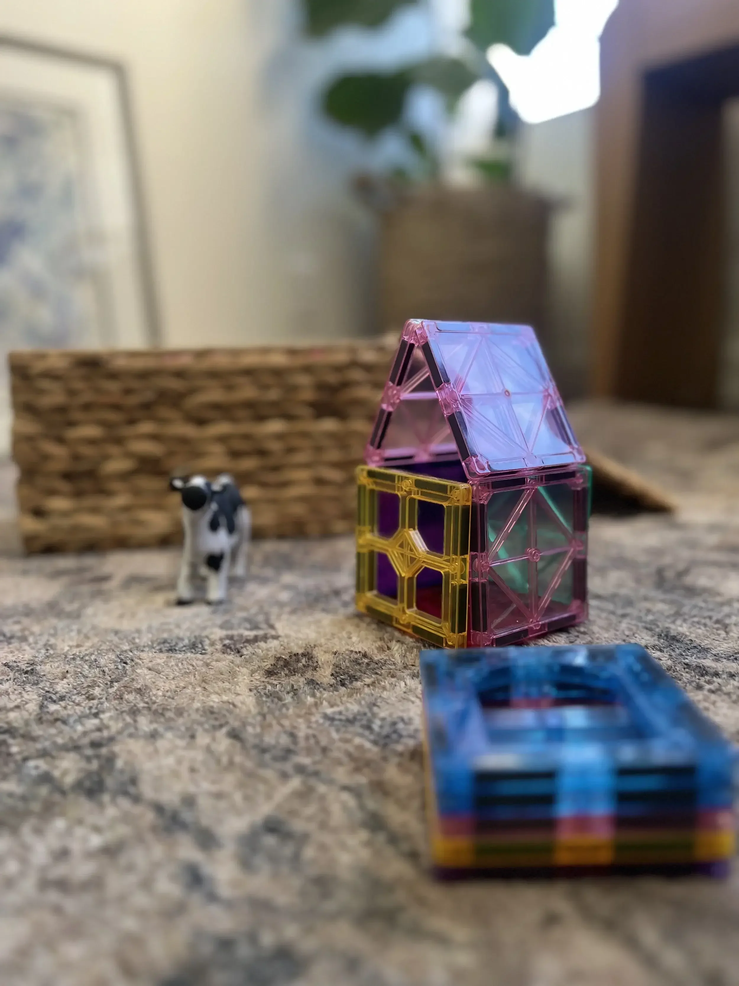 child play therapy magnetic tile toys on carpet