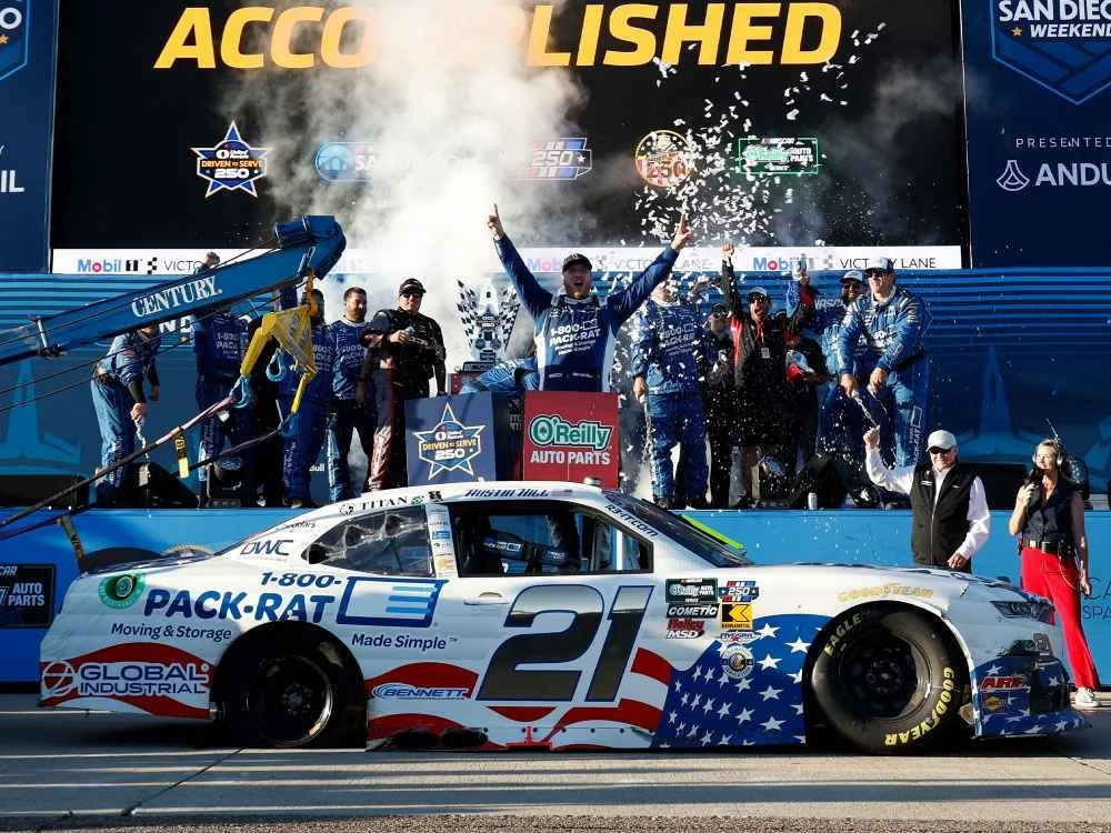 ($86.50) *Preorder* Austin Hill 2026 1-800-PACK-RAT Patriotic San Diego 6/20/26 Race Win 1:24 Nascar Diecast - FOIL NUMBER CAR - O'Reilly Auto Parts Series