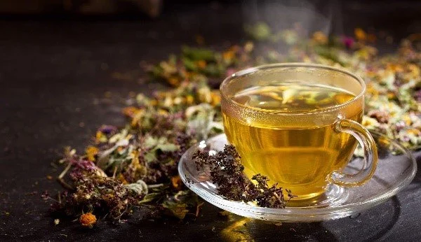 Steaming hot cup of herbal tea