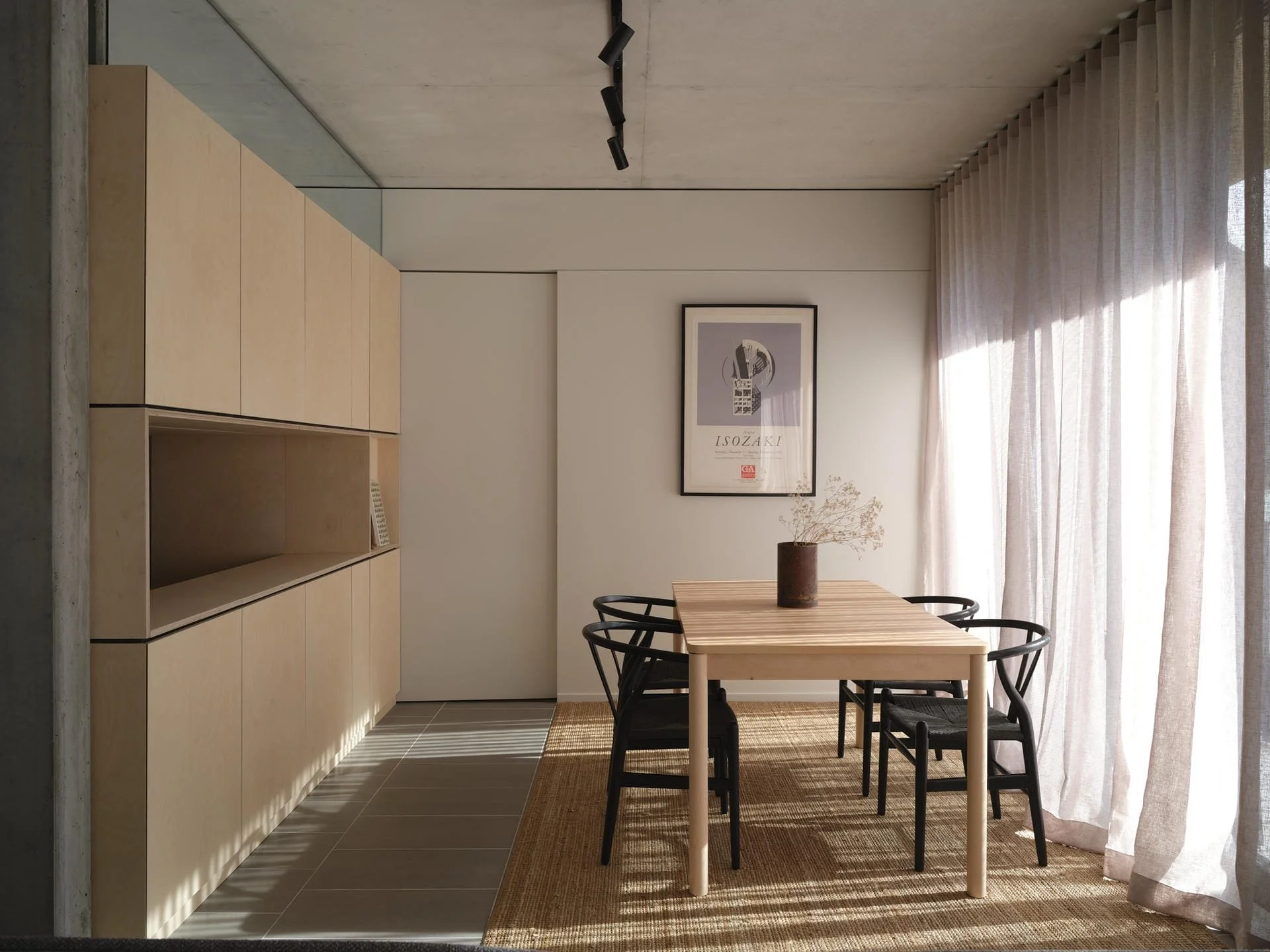 Modern bespoke joinery in Kingston, Canberra, featuring minimalist plywood storage and clean architectural lines by asmbl.