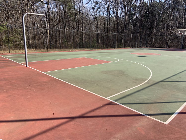 Raleigh, North Carolina basketball court repair and resurface at Arium at Lake Johnson before