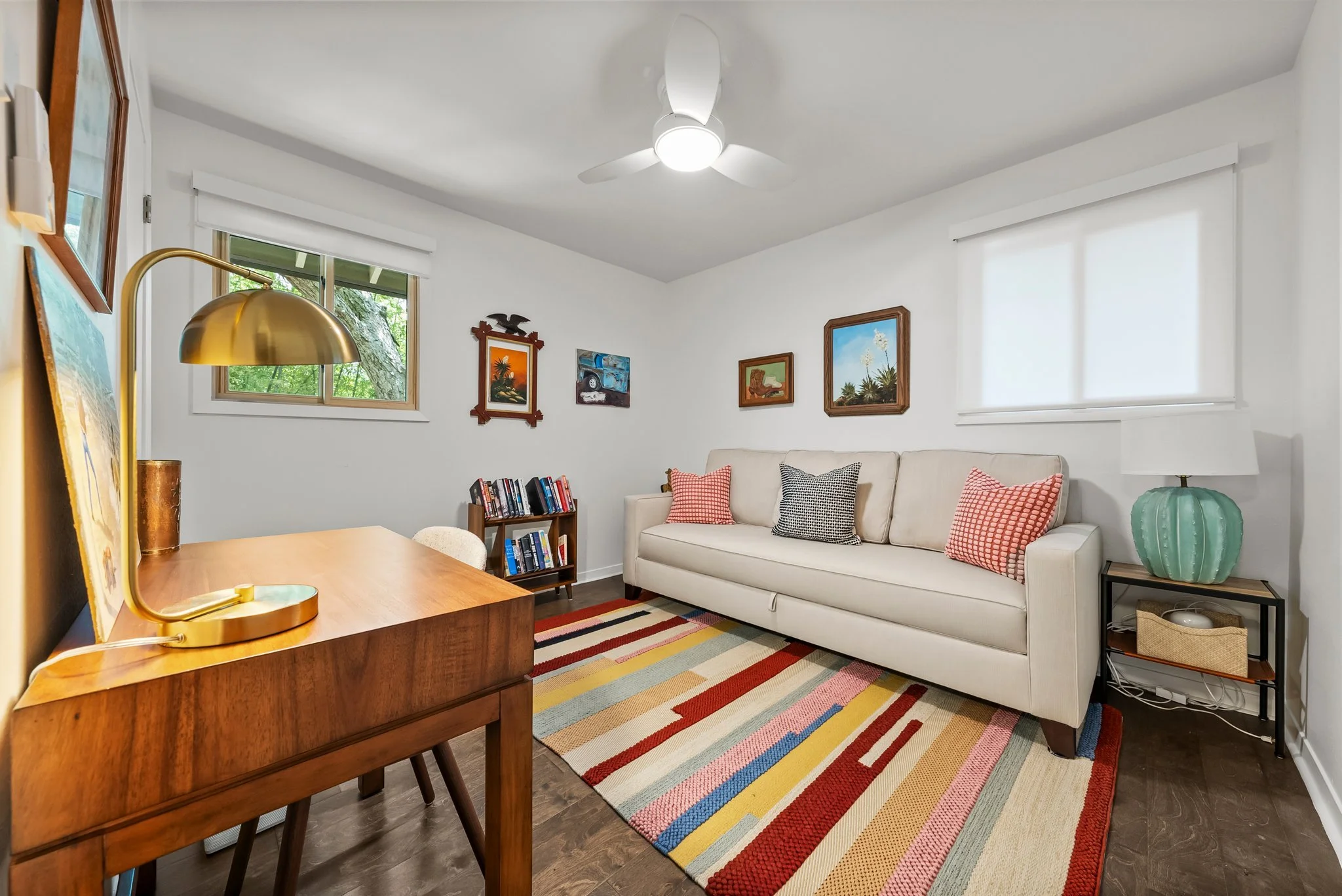 Dedicated workspace, double (size) sofa bed, bed linens, ceiling fan, books and reading material, room darkening shades