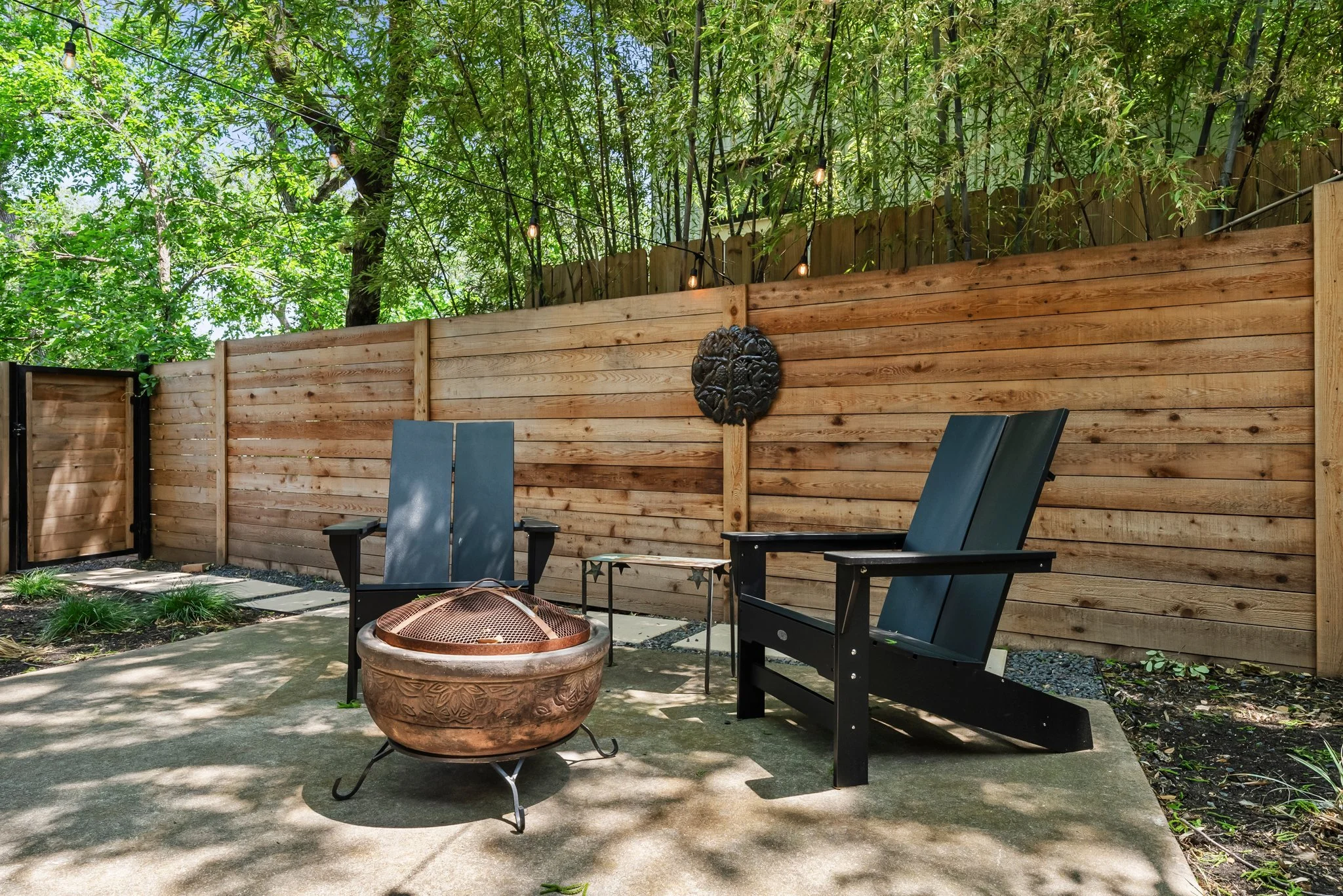 Adirondack chairs in backyard area