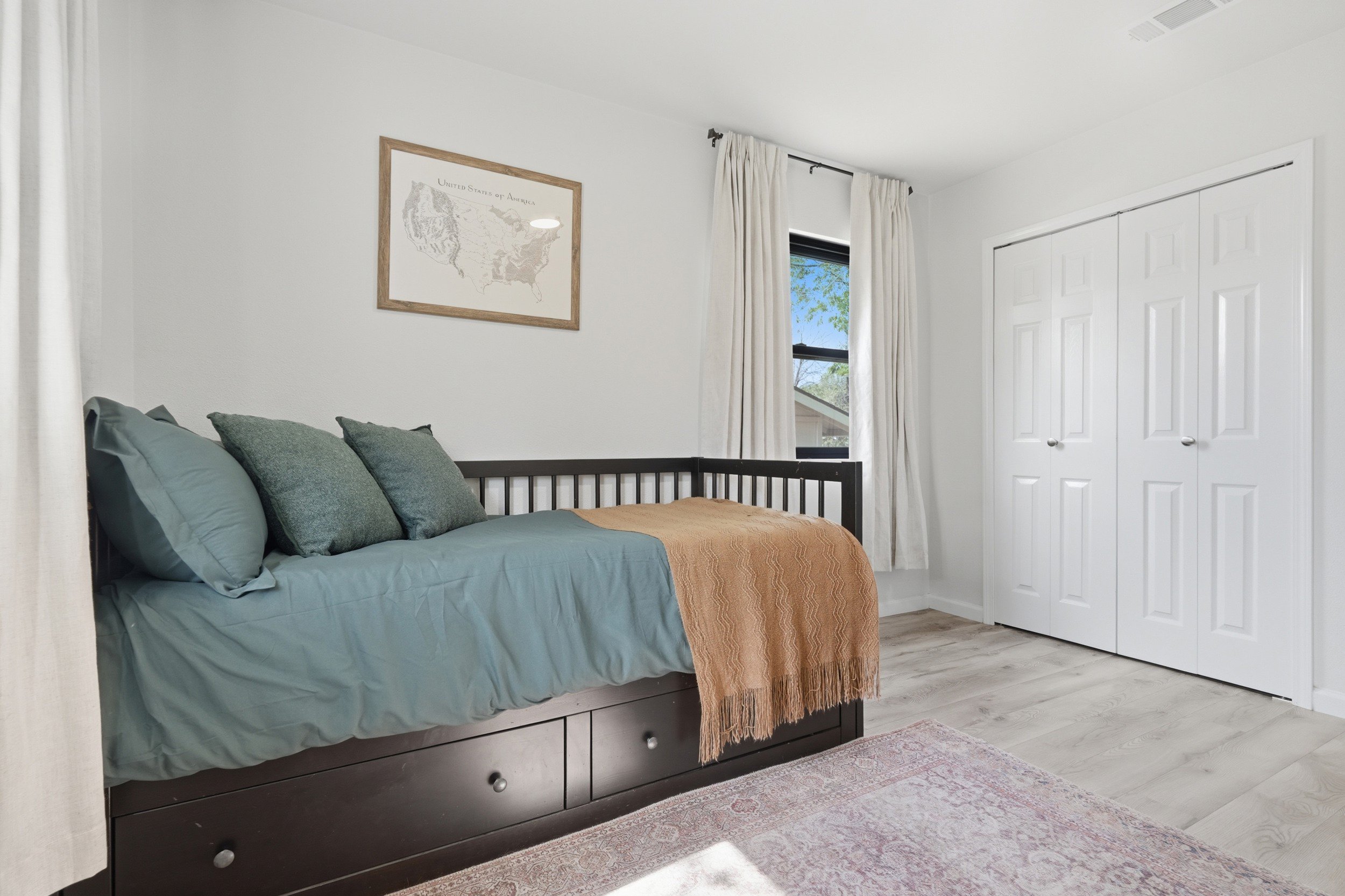 Bedroom #3 with twin bed. Can be converted to a queen with the trundle under bed