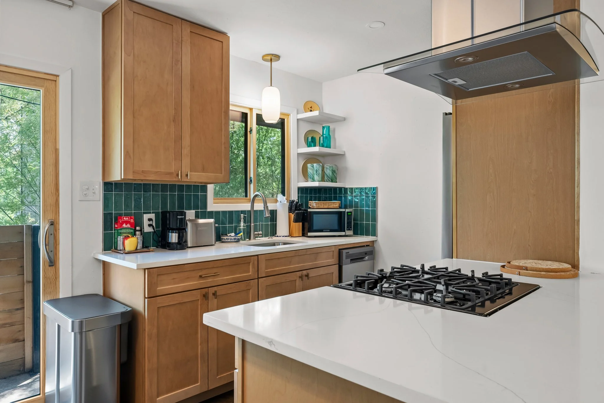 Full kitchen. Coffee maker, hot water tea kettle, toaster, dishes and silverware, baking sheet, dishwasher, refrigerator, freezer, stove, toaster, microwave, wine glasses, cleaning products
