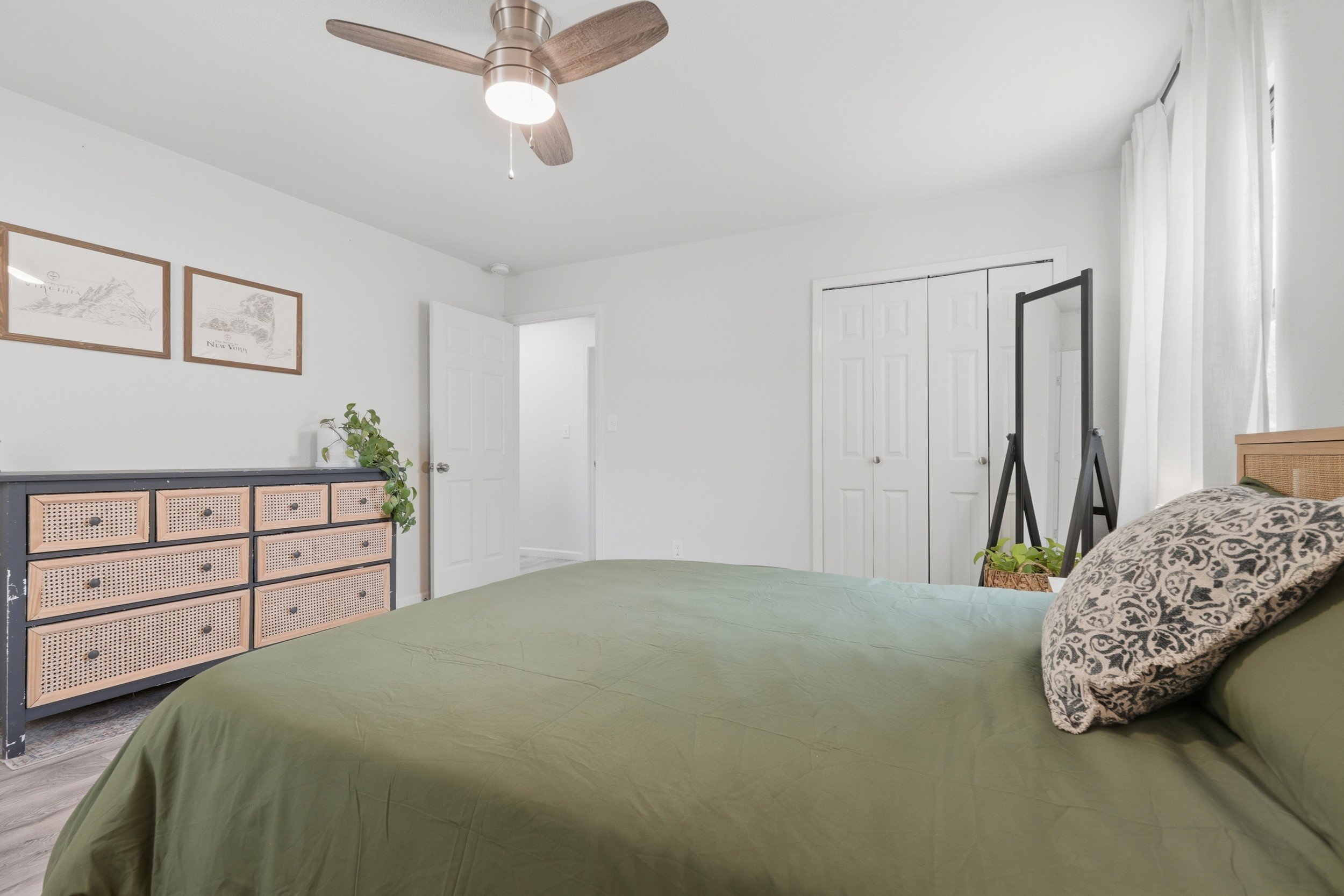 Primary bedroom with clothing storage 
