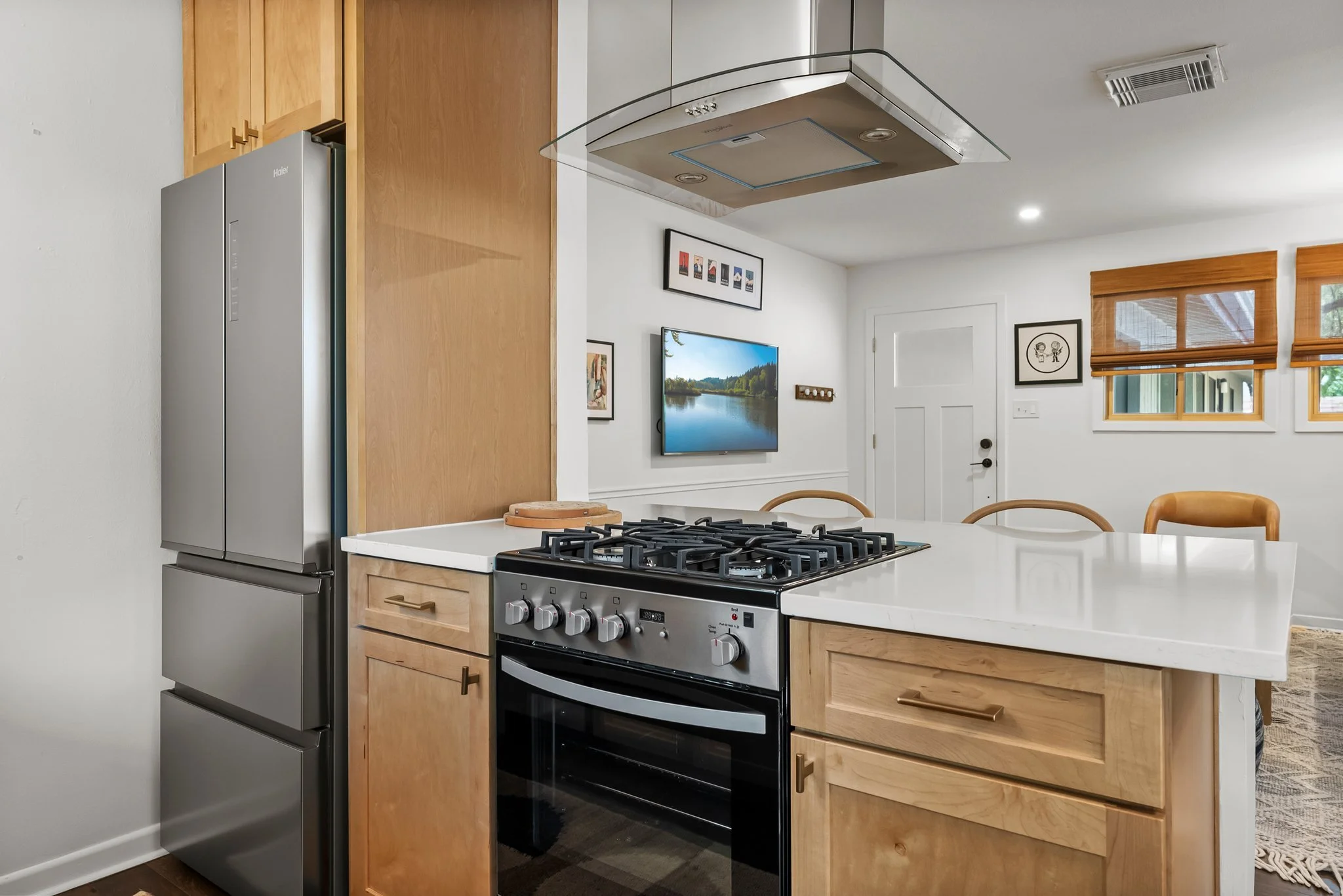 Full kitchen. Coffee maker, hot water tea kettle, toaster, dishes and silverware, baking sheet, dishwasher, refrigerator, freezer, stove, toaster, microwave, wine glasses, cleaning products