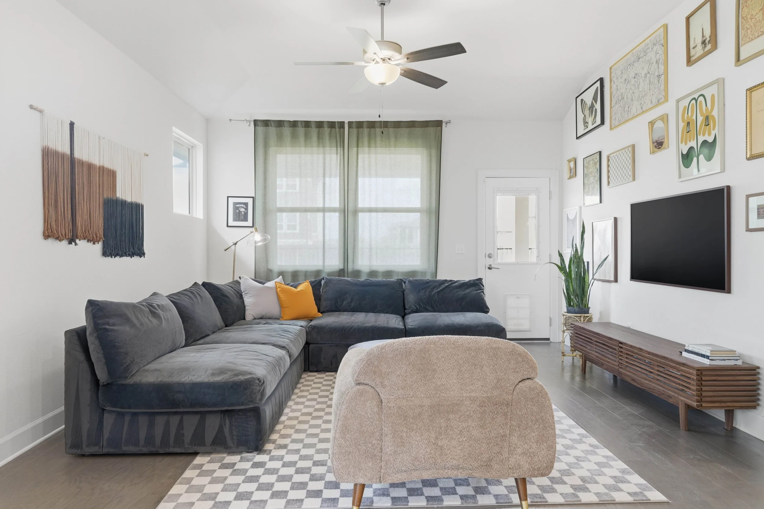 Comfy couch with reading lamps in living room.jpg