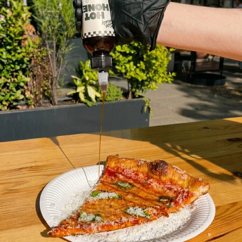 slice-society-hot-honey-pizza-drizzle.png