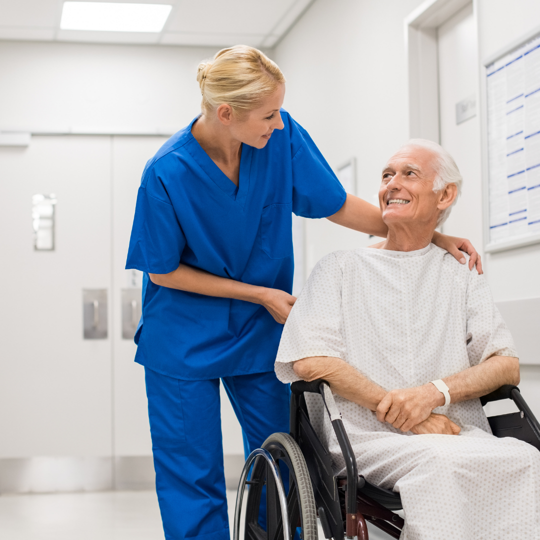 man in wheelchair with nurse