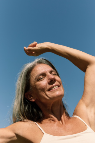 Woman smiling on a sunny day