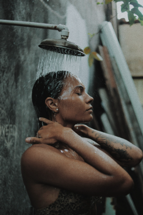 Woman taking a warm shower
