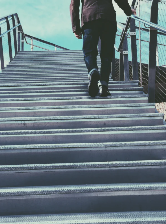 Person walking up stairs