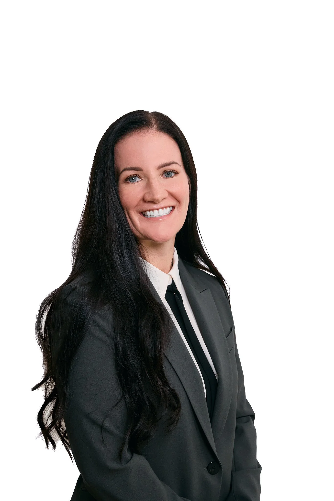 Female brunette attorney in green suit