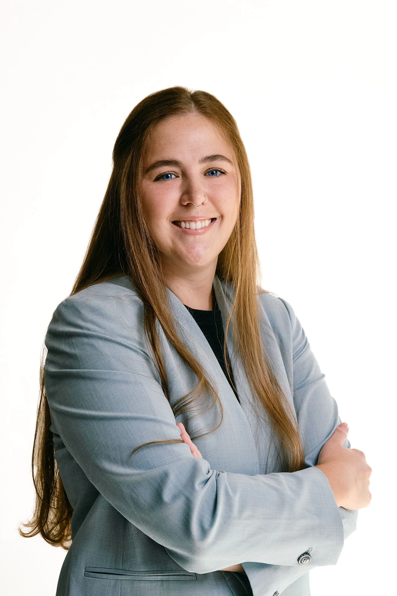 Female red head attorney in blue suit