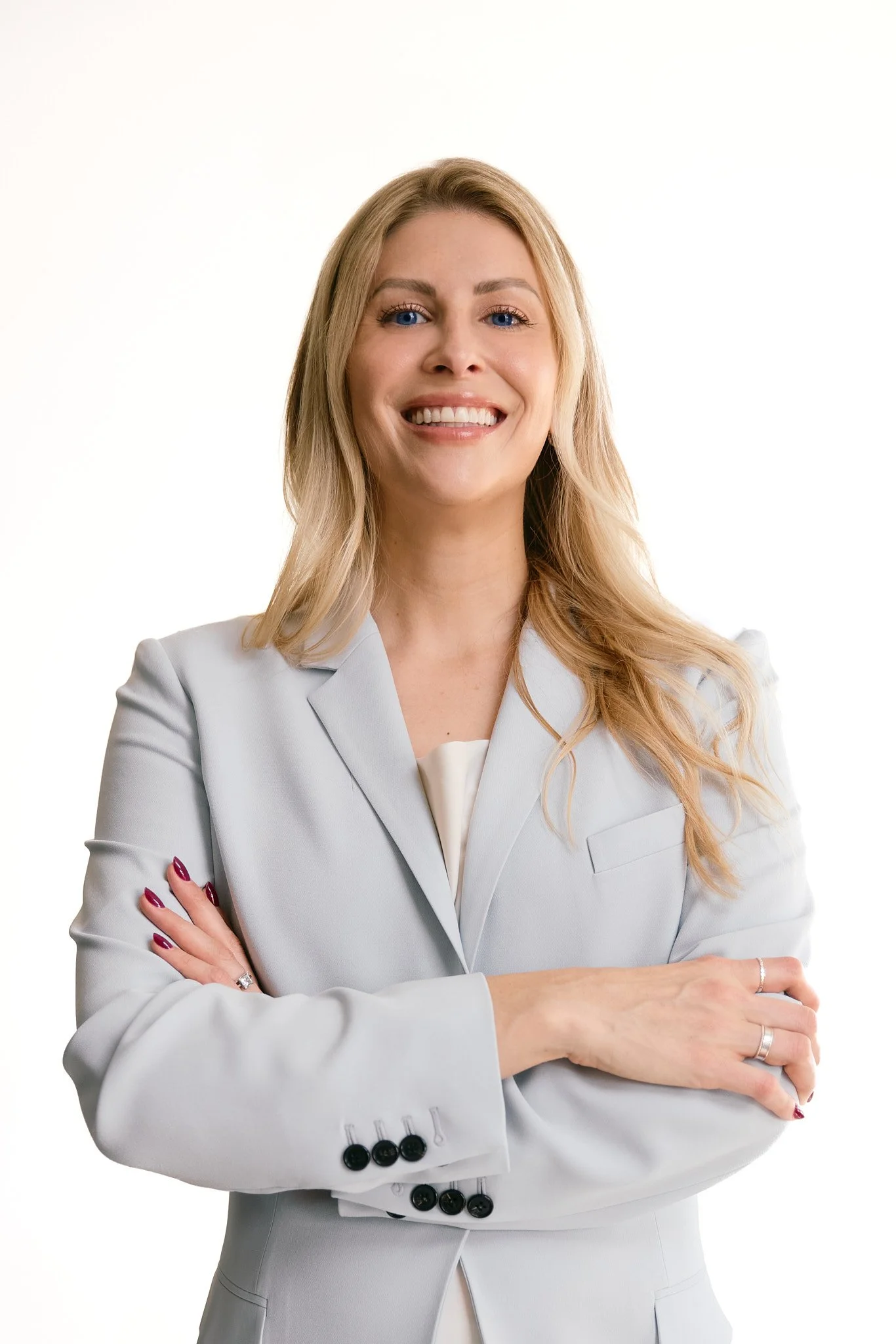 Female blonde attorney in blue suit
