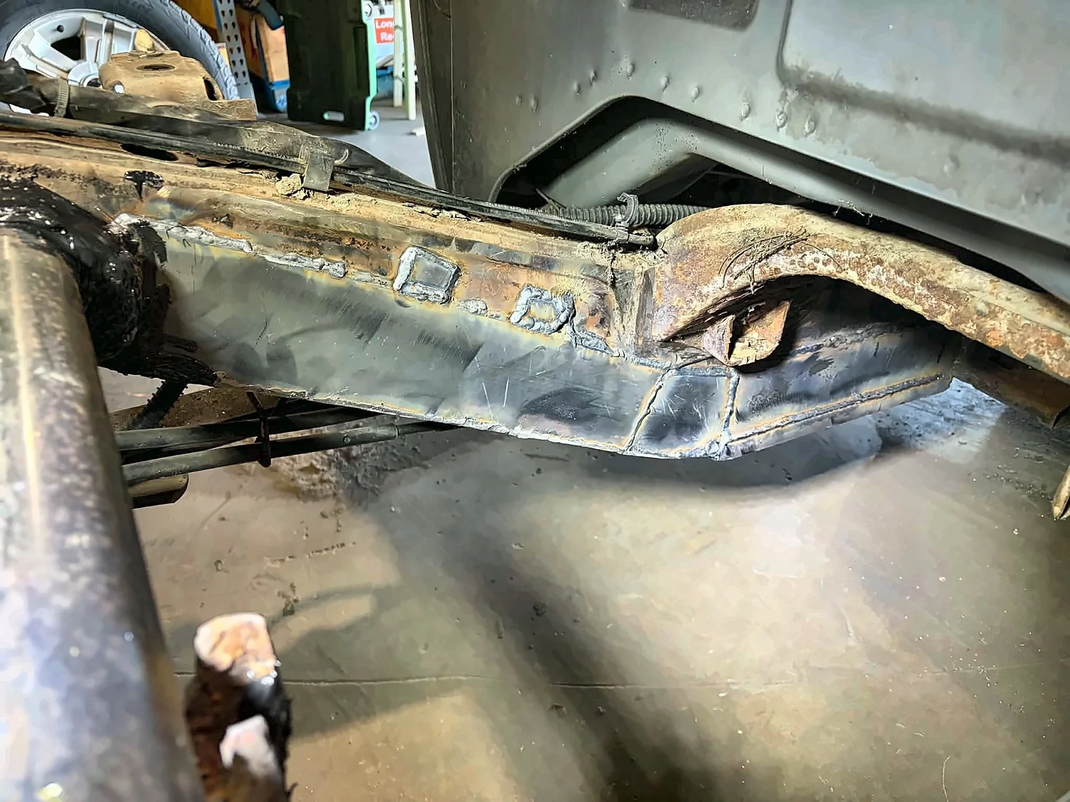 After: the same frame repaired with welded steel