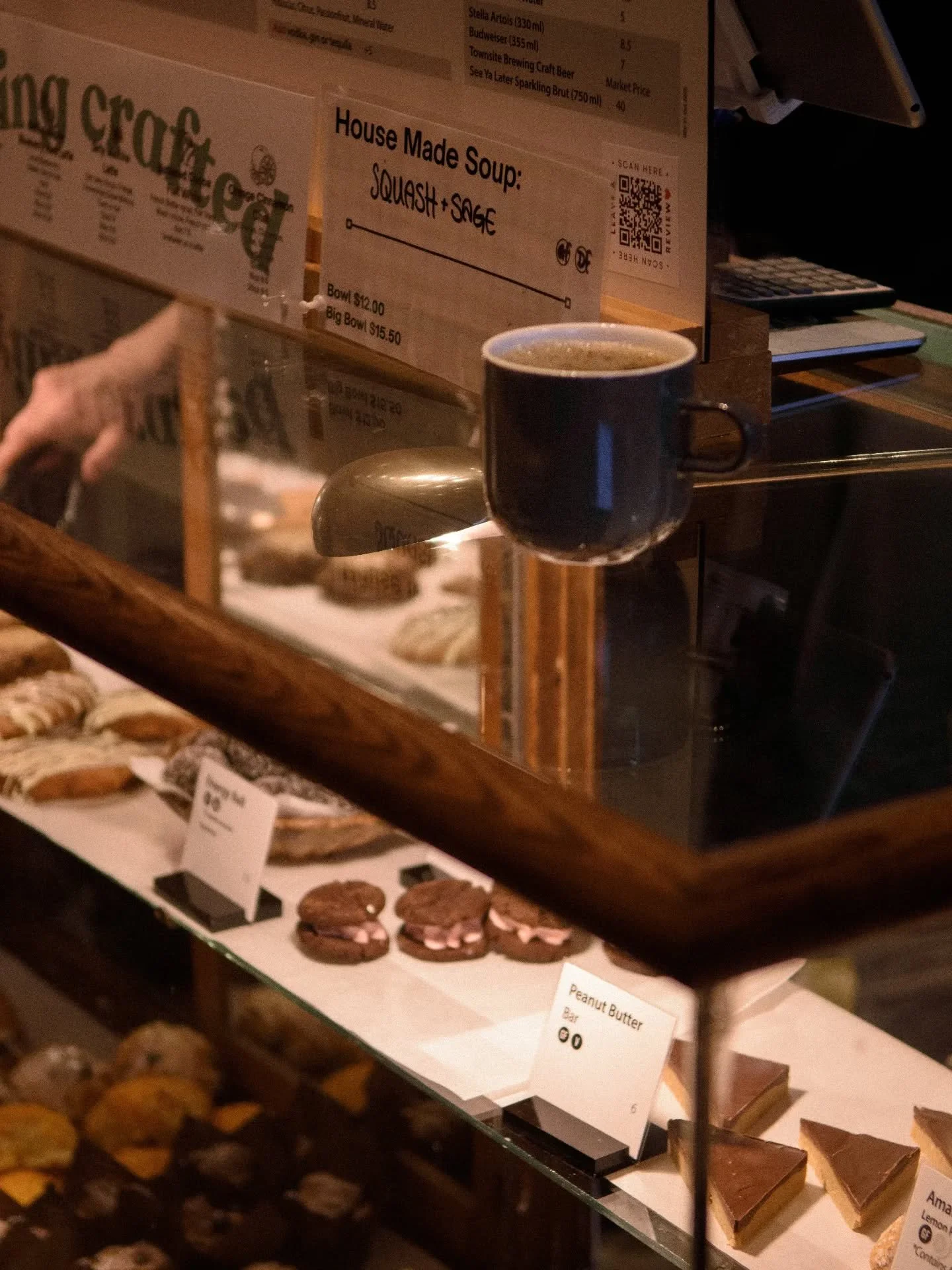 Wait&hellip; is our mug floating?! 👀☕✨

We thought so too for a second.

But nope &mdash; just perfectly perched on our glass display case admiring our fresh bakery treats.

And honestly&hellip; can you blame it?

If you were surrounded by a lineup 