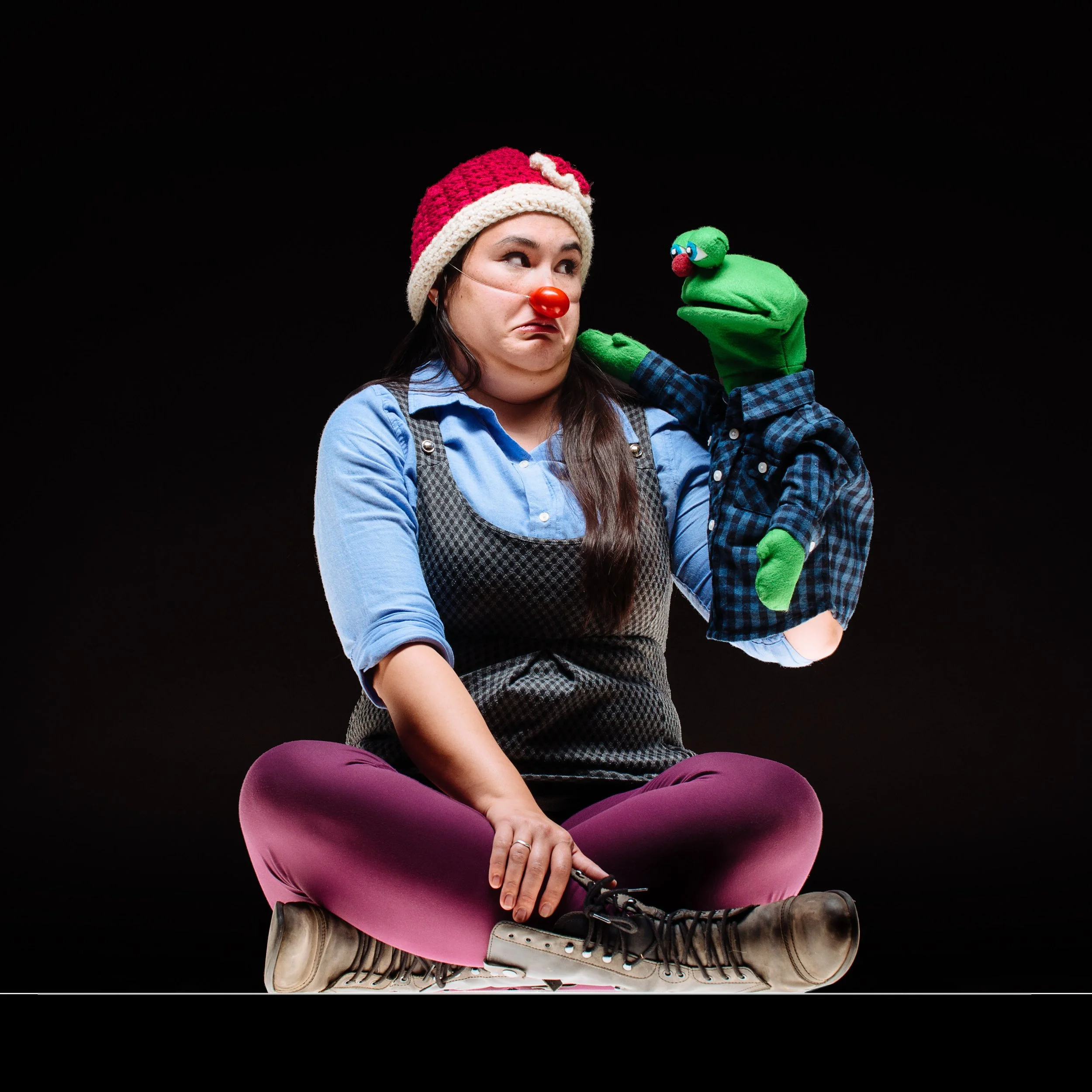 Puppeteer Ali DeRegt with one of her own puppets.