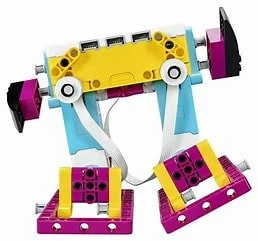 Colorful toy robot with yellow, pink, blue, purple, and white parts