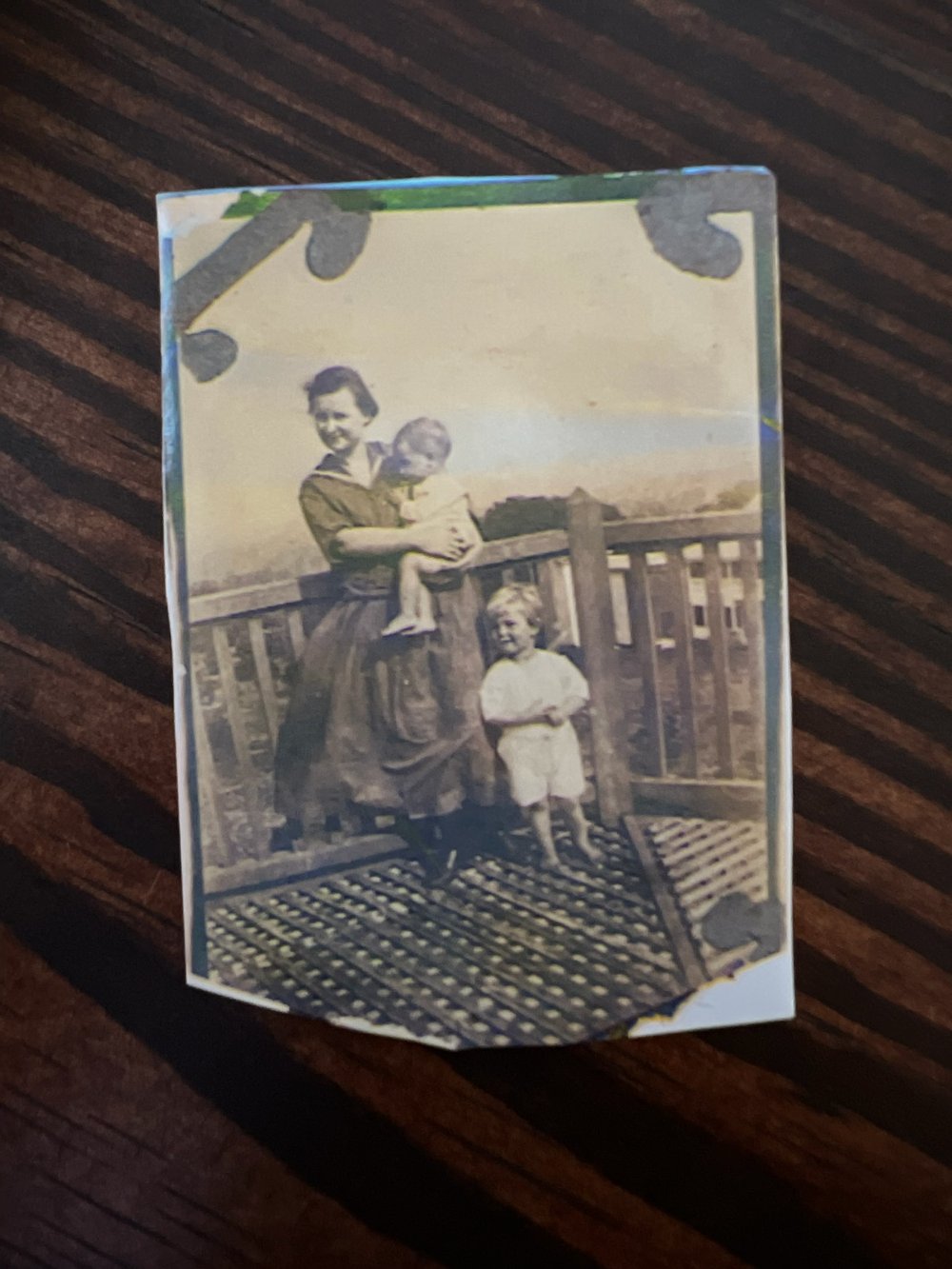  Cora McKeown Snow holding Roy with Gene to right at Chinsegut on water tower 