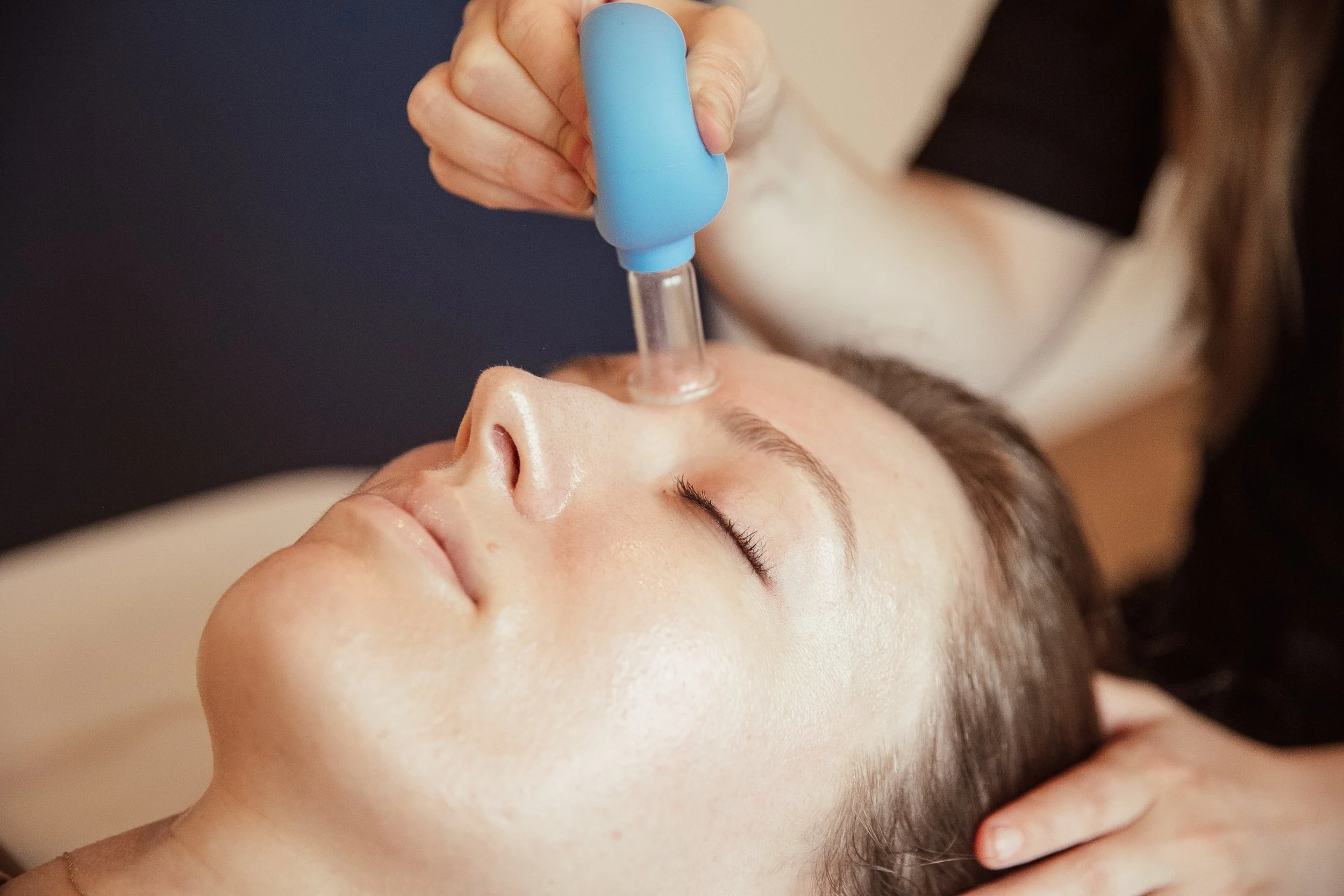 More Than a Glow: Gua Sha and Cupping for Facial Tension