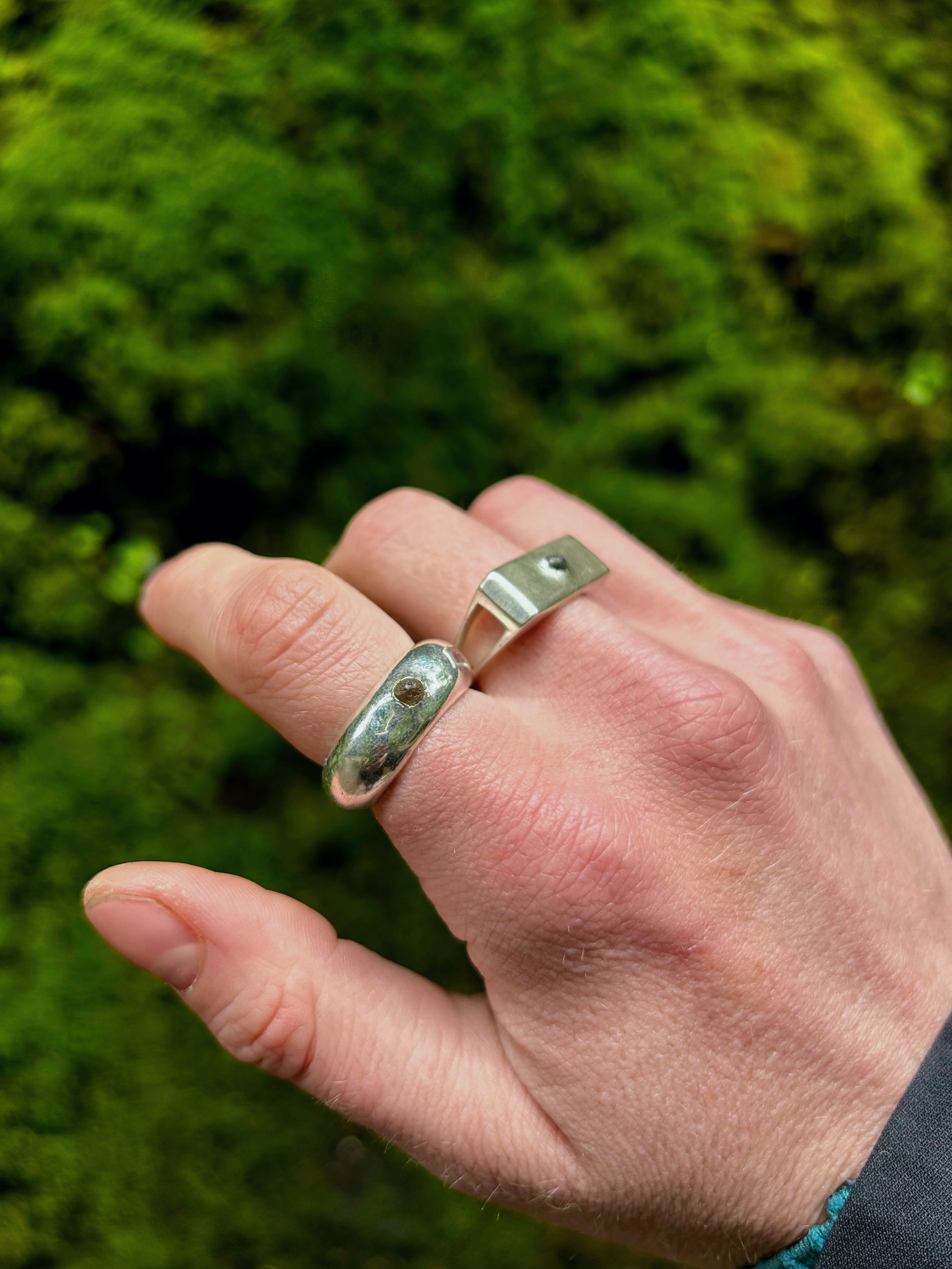 sapphire cast in place on fingers side view 2.jpg