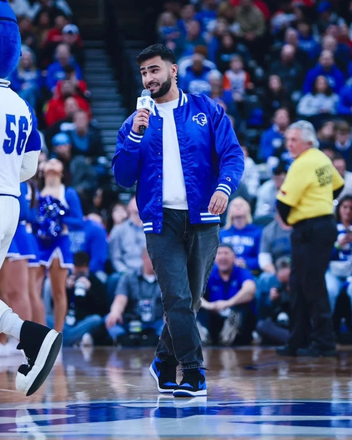 Jayden Becker, professional in-arena host, energizing the crowd during a Seton Hall men’s basketball game at Prudential Center in Newark, New Jersey.