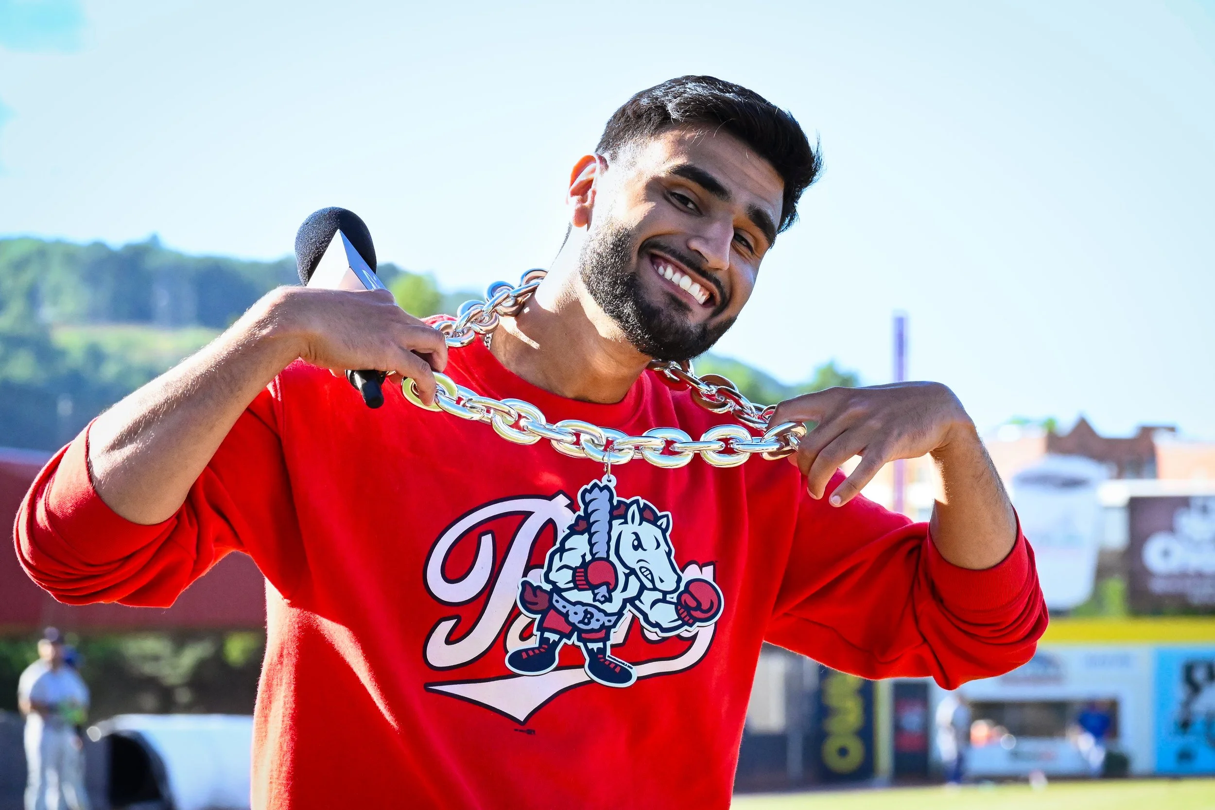 Jayden Becker, professional live event host, energizing the crowd as in-arena host for the Binghamton Rumble Ponies at Mirabito Stadium during a Minor League Baseball game.
