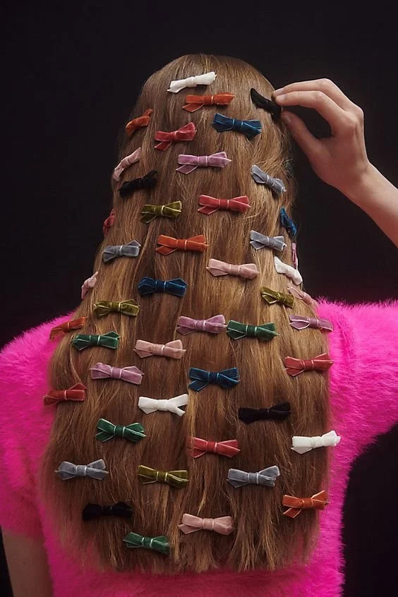 Bows attached to hair clips
