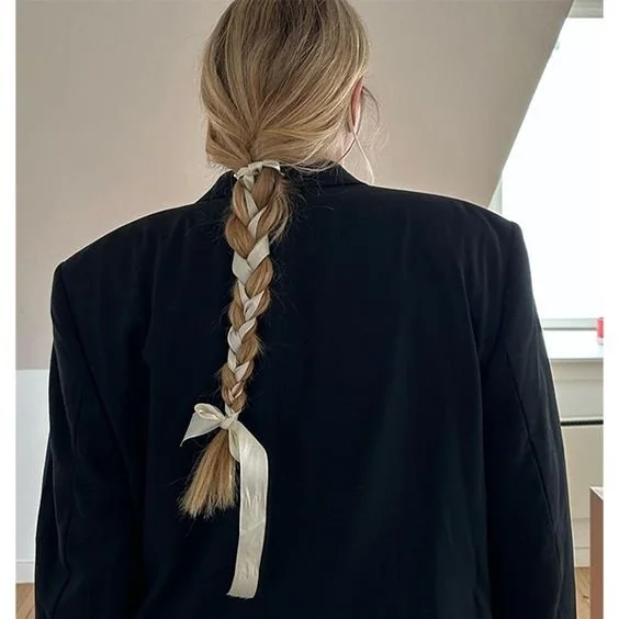 Tying ribbon in your hair