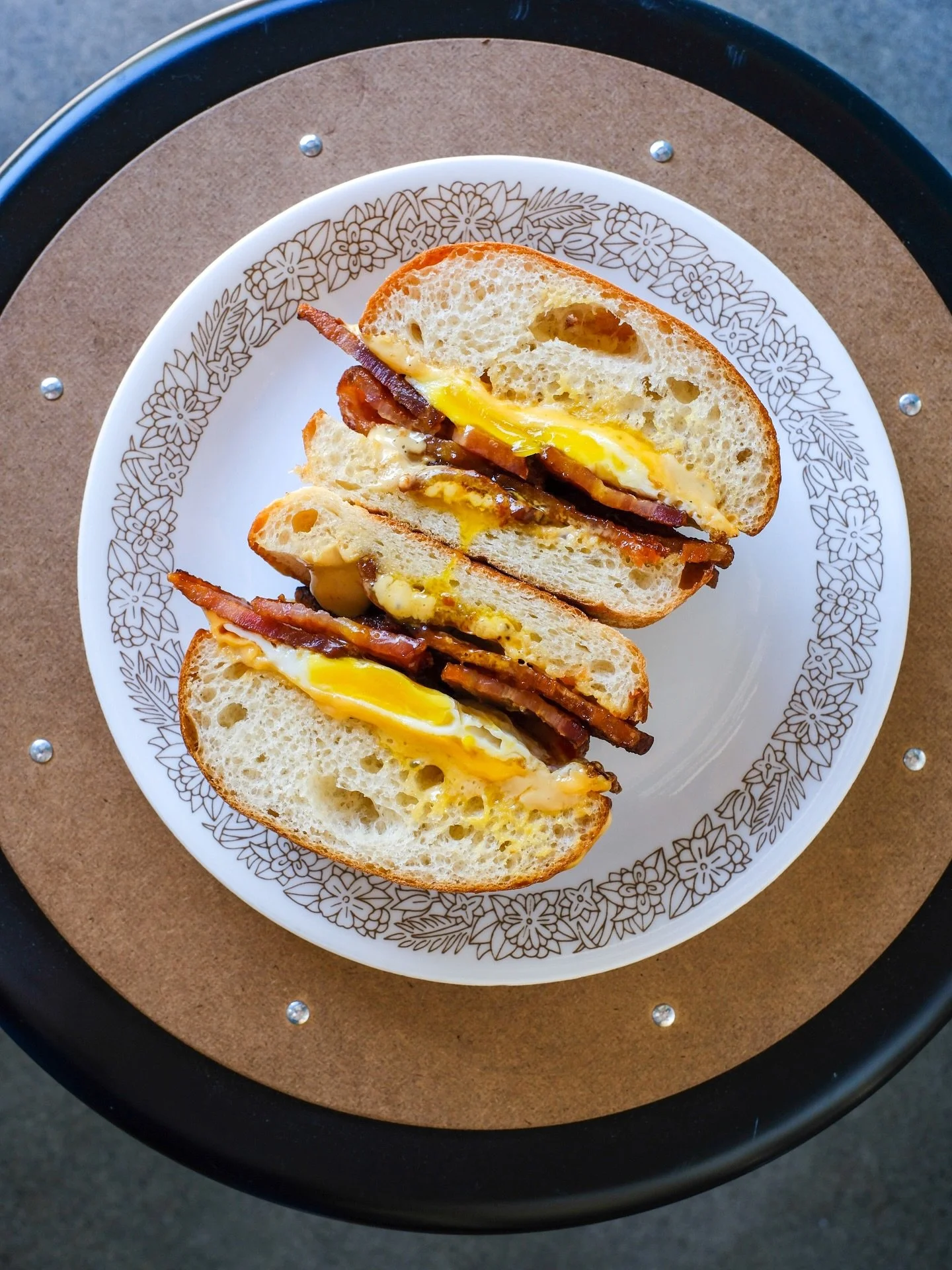 Don&rsquo;t Go Bacon My Heart - promise we won&rsquo;t! Three thick-cut slices of bacon, a cage-free fried egg, American cheese &amp; Lake sauce on a toasted @grandcentralbakery potato bun.