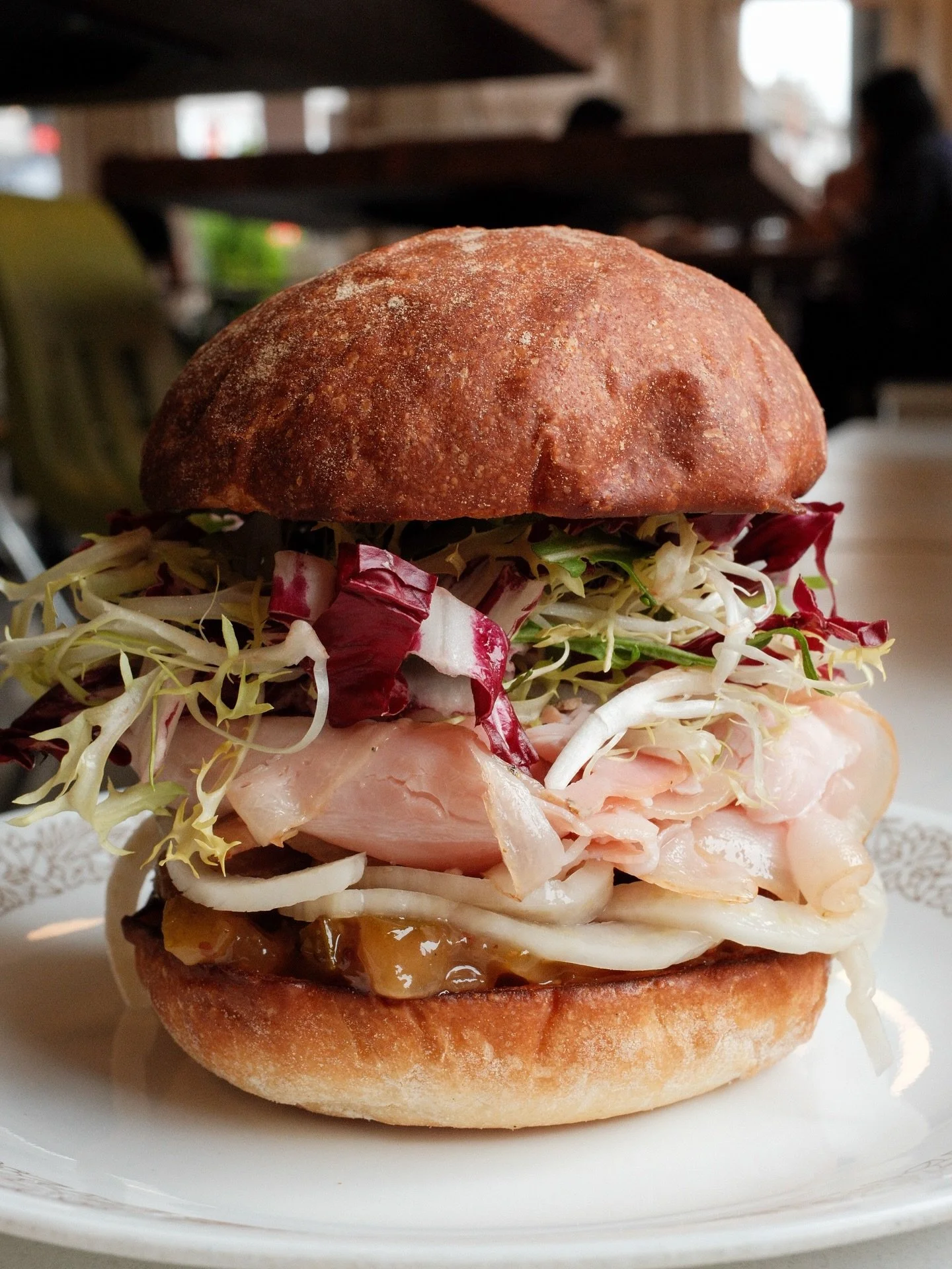 Get in your canoe and paddle over 🌧️ 🛶 currently on the specials board; thinly sliced, warm PORCHETTA, pear mostarda, pickled fennel, chicories and orange scented olive oil on a toasted @grandcentralbakery potato bun.