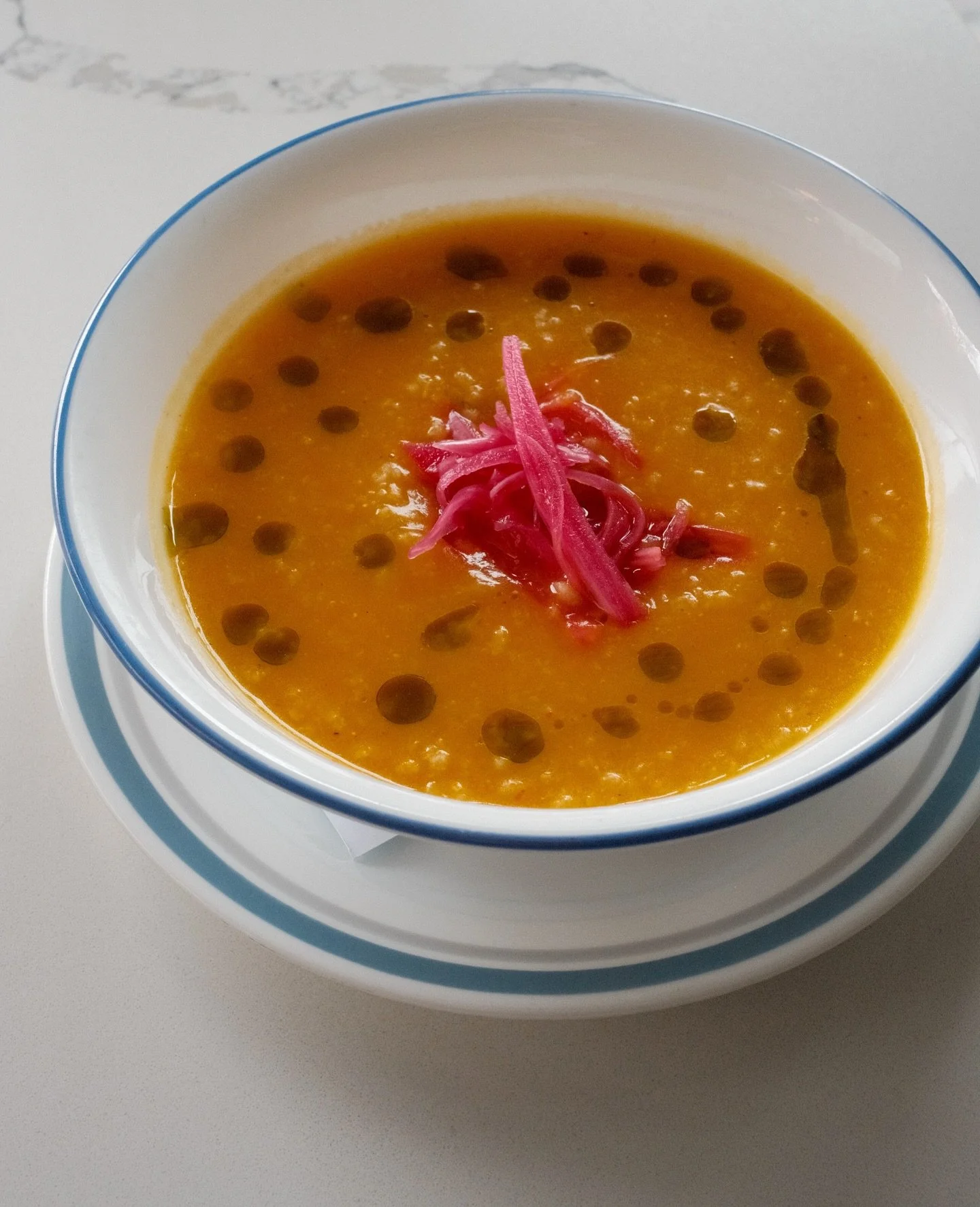 Kuri Squash Porridge - an absolute must on a foggy day like today. It&rsquo;s comfort in a bowl topped with pickled shallots and cilantro oil. Pair it with a sandwich and score extra points in our book.