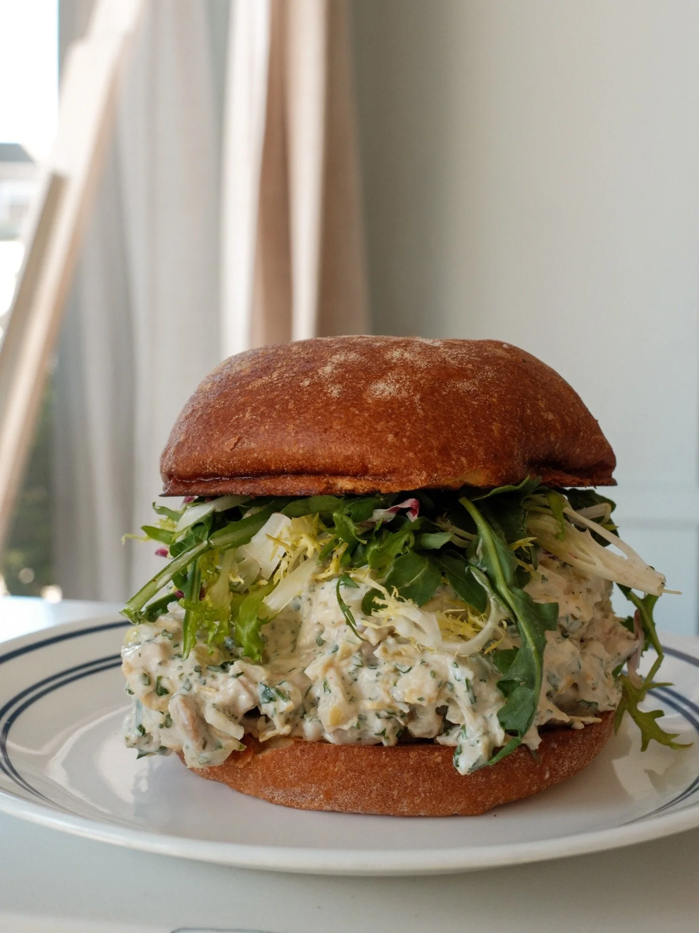 Spring Chicken Salad Sando is for lunch folks! On the specials board now until&hellip; ⏰ 🤷🏻&zwj;♀️ 
Roast chicken, lemon aioli, artichoke, pickled fennel&amp; herbs on a griddled @grandcentralbakery potato bun