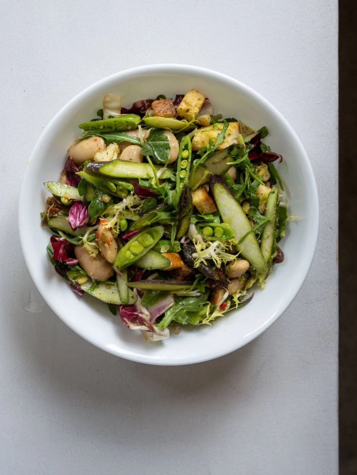 Mr. Bean and Little Caesar are back, and pumped full of seasonal veg like snap peas, asparagus and chicories. Don&rsquo;t forget the creamy gigante beans, parmesan and crunchy croutons - yes we offer gluten free!  So good, you&rsquo;ll be boasting &l