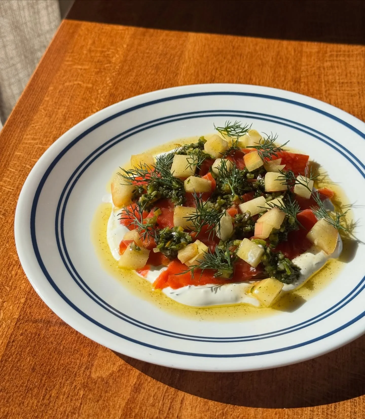 Soup season is on hiatus while Spring/Summer small plates take the hot seat. First up! House-Cured Sockeye Salmon with sour cream, salsa verde, apple &amp; vanilla oil. This dish is PNW Spring in a bite; fresh, salty and bright! Open daily from 10AM-