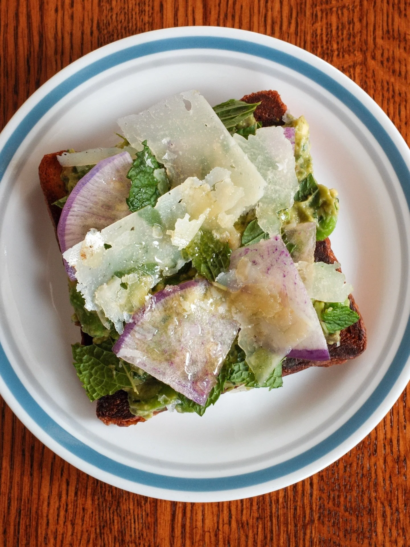 Avocado-Fava Bean Toast of your Saturday dreams!! 
Smashed avocado, spring fava beans, radish, mint and pecorino on griddled table bread.